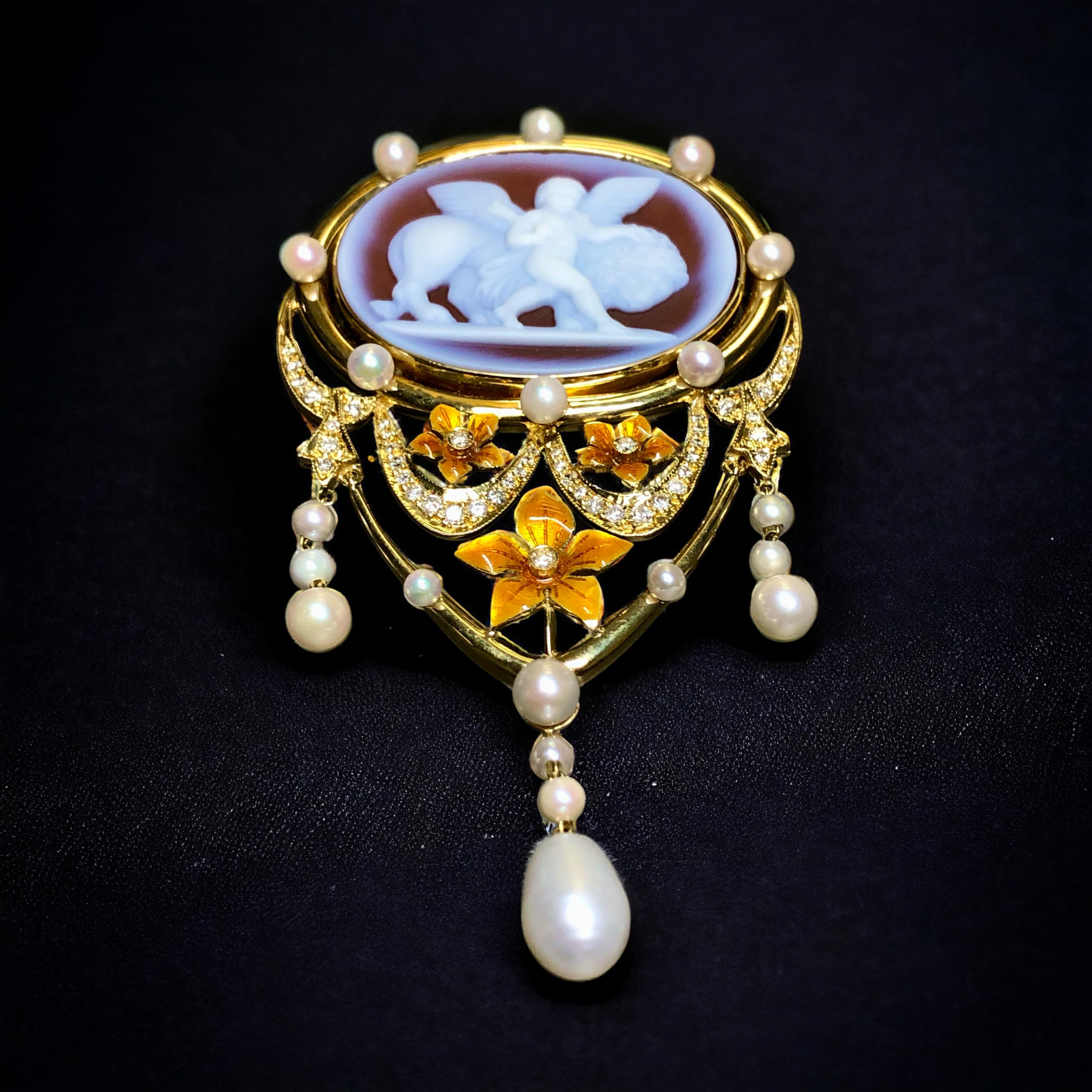 
A beautiful vintage (not antique) brooch that can also be worn as a pendant. It is beautifully done in 18K yellow gold with the main focal point being a beautiful high relief carnelian cameo surrounded by beautifully enameled flowers, pearls and