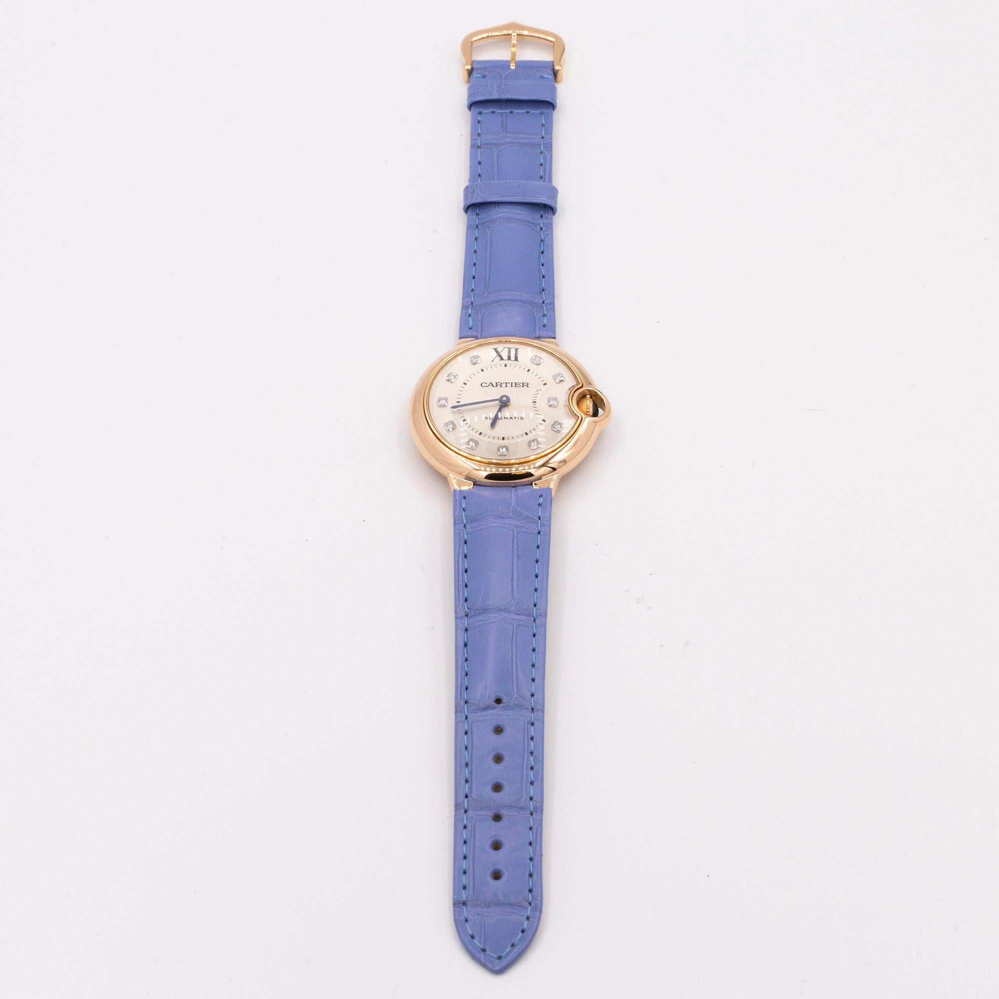 Vintage 18K Rose gold Cartier Ballon Bleu watch. 36mm case. The watch has an automatic
movement, diamond markers and a genuine Cartier strap. 
Model # WSBB0010( OLD#WE902028)
Serial #3003460051VX .
Box and Papers are included.