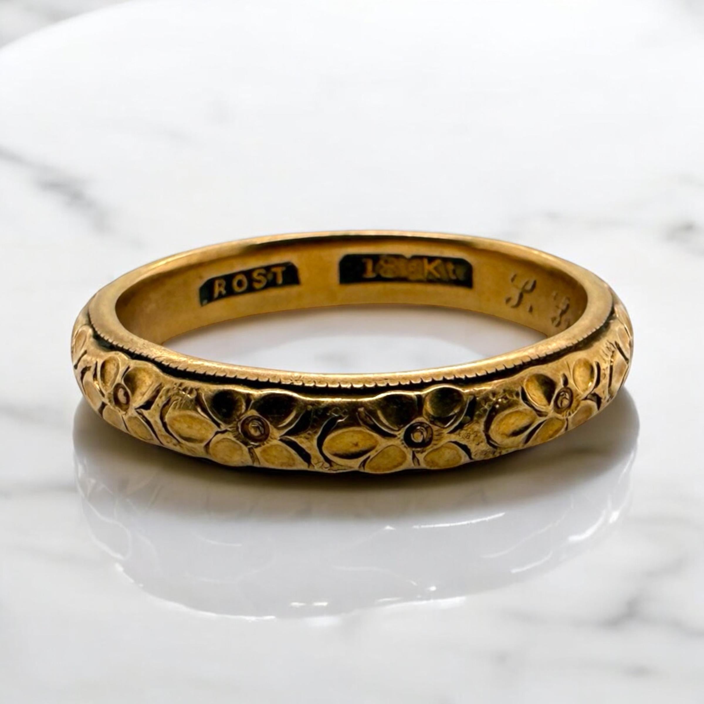 We always love vintage engraved wedding bands!!

Ring Details
Material: 18K Rose Gold
Era: Art Deco 1920 - 1940
Inside Engraving: P.L.W. To F.E.A 11 - 19 - 24
Width: 4mm
Weight: 6.9 Grams
Finger Size: 10
Sizable Upon Request

Item: 768TMV8-AGI