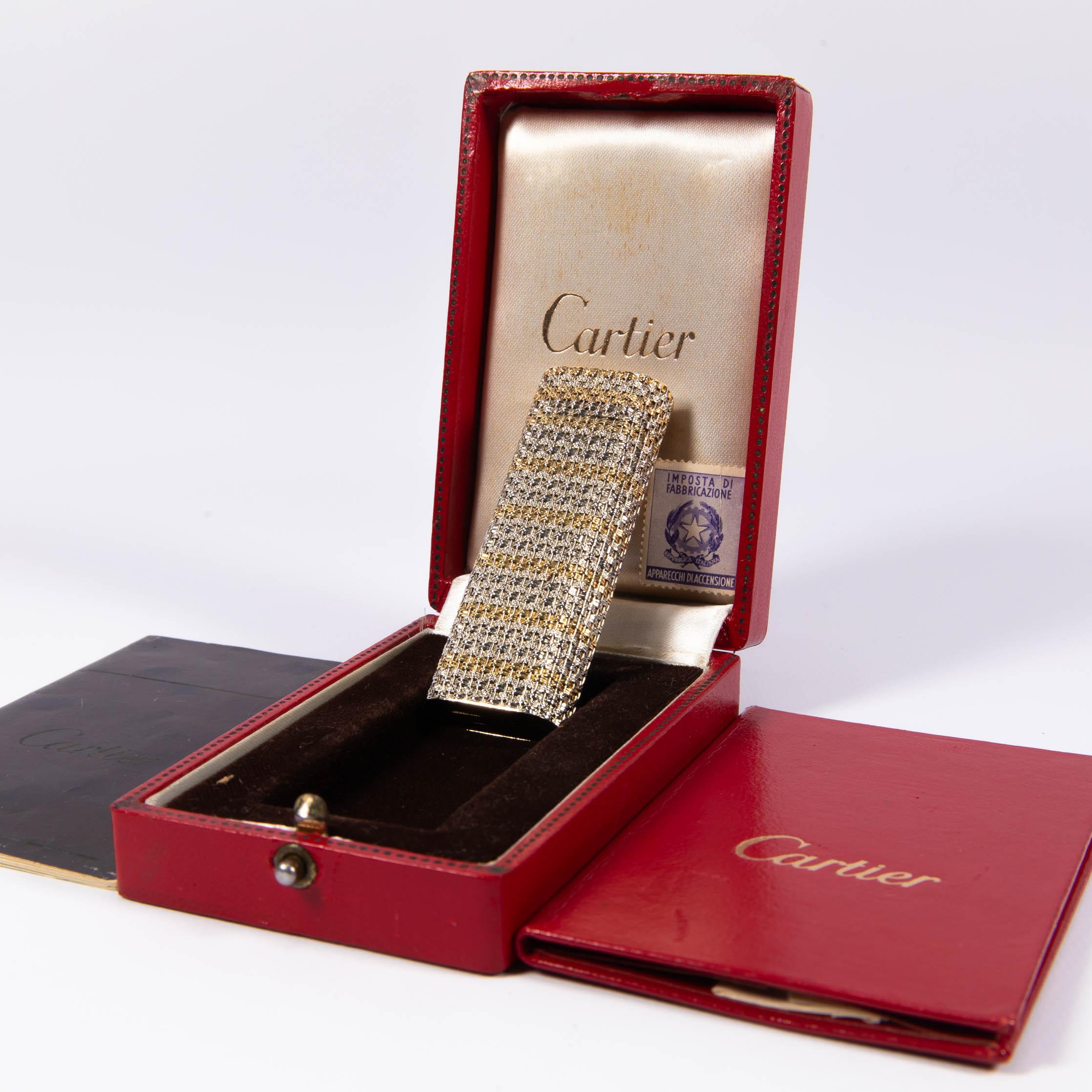 Vintage 18K Solid Gold Sleeved Cartier Les Must lighter

This absolute masterpiece of a lighter is an 18-karat solid gold-sleeved Cartier Les must lighter. It is fully functional, sparks excellent, and does not leak. The lighter is in a rare