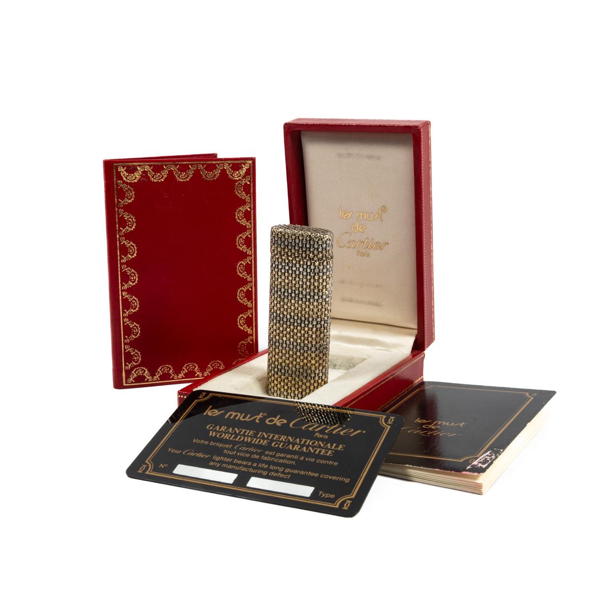 Vintage 18K Solid Gold Sleeved Cartier Les Must lighter

This absolute masterpiece of a lighter is an 18-karat solid gold-sleeved Cartier Les must lighter. It is fully functional, sparks excellent, and does not leak. The lighter is in a rare