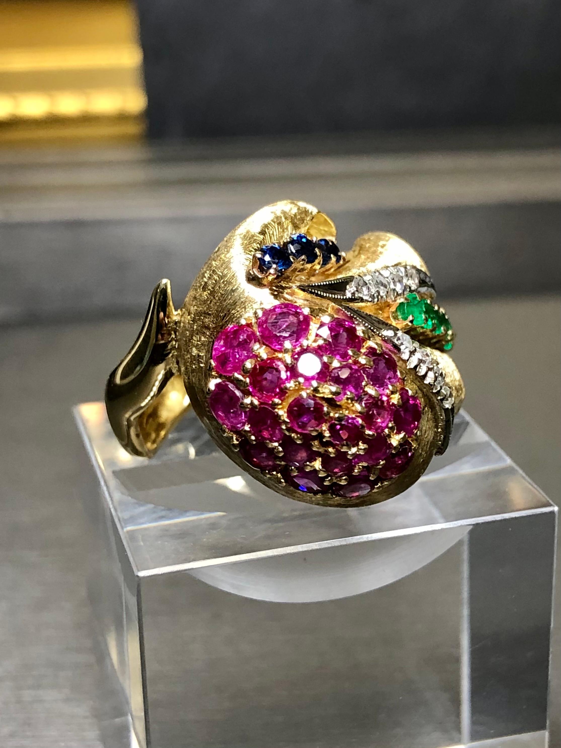 
An absolutely fabulous free form design cocktail ring by none other than than one of our favorite American jewelry houses, Spitzer + Furman (signed and numbered). It has been hand crafted in 18K yellow gold and set with approximately 2.30cttw in