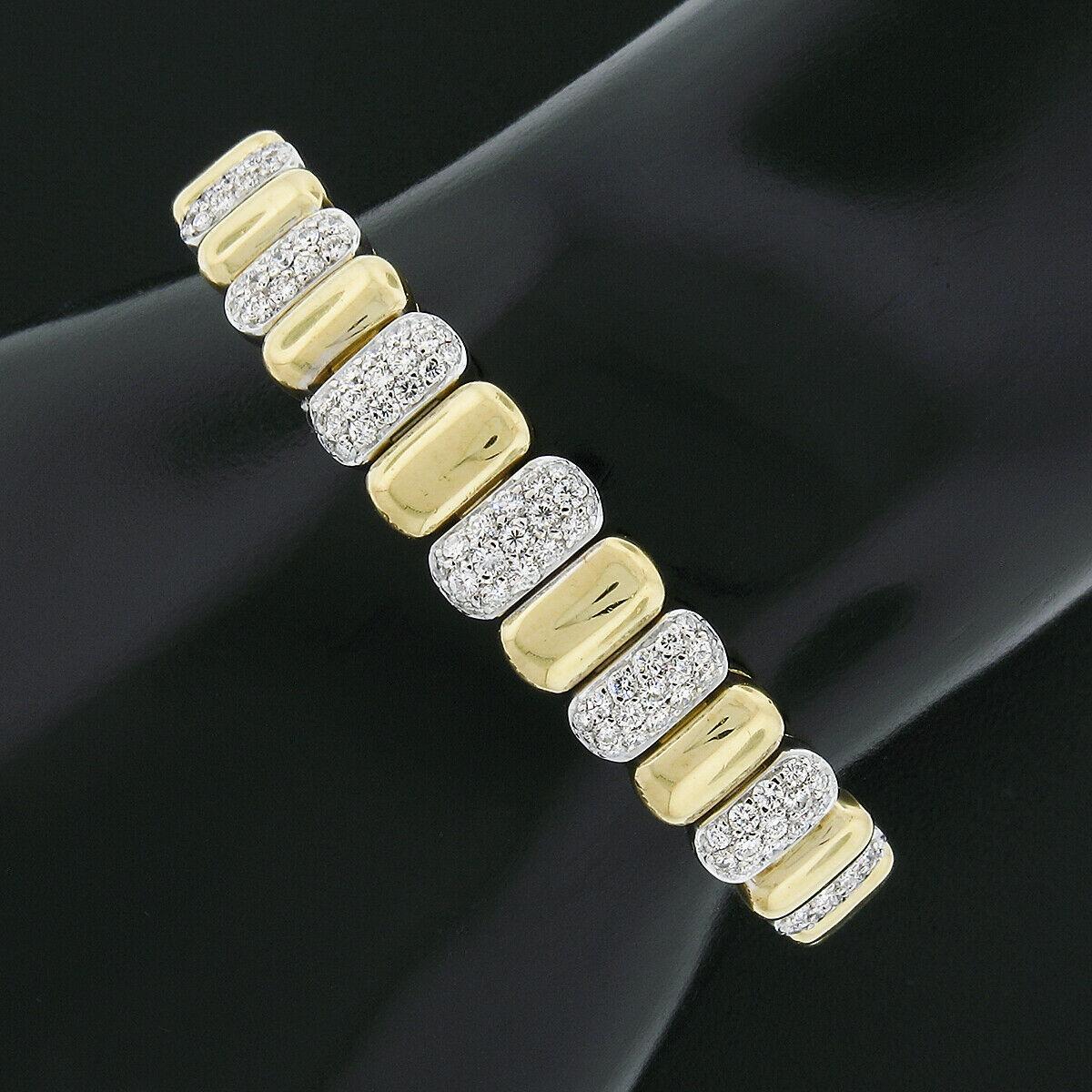 Here we have an absolutely gorgeous vintage bracelet crafted in 18k solid yellow and white gold. It features an elegant design constructed from graduating oval links that have a nice high-polished finish throughout with 7 links neatly pave set with