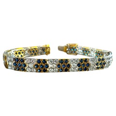 Pulsera vintage de 18 quilates con dos tonos de diamantes y zafiros
