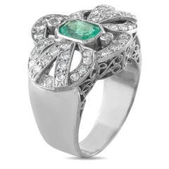 Bague vintage en or blanc 18 carats, sertie d'un diamant de 0,84 ct et d'une émeraude – MF04-063026