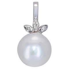 Pendentif vintage en or blanc 18 carats, avec une perle des Mers du Sud de 15 mm et des diamants