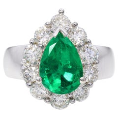 Anello Vintage in oro bianco 18k con smeraldo da 1,91 carati e diamante a raggiera da 1,70 carati