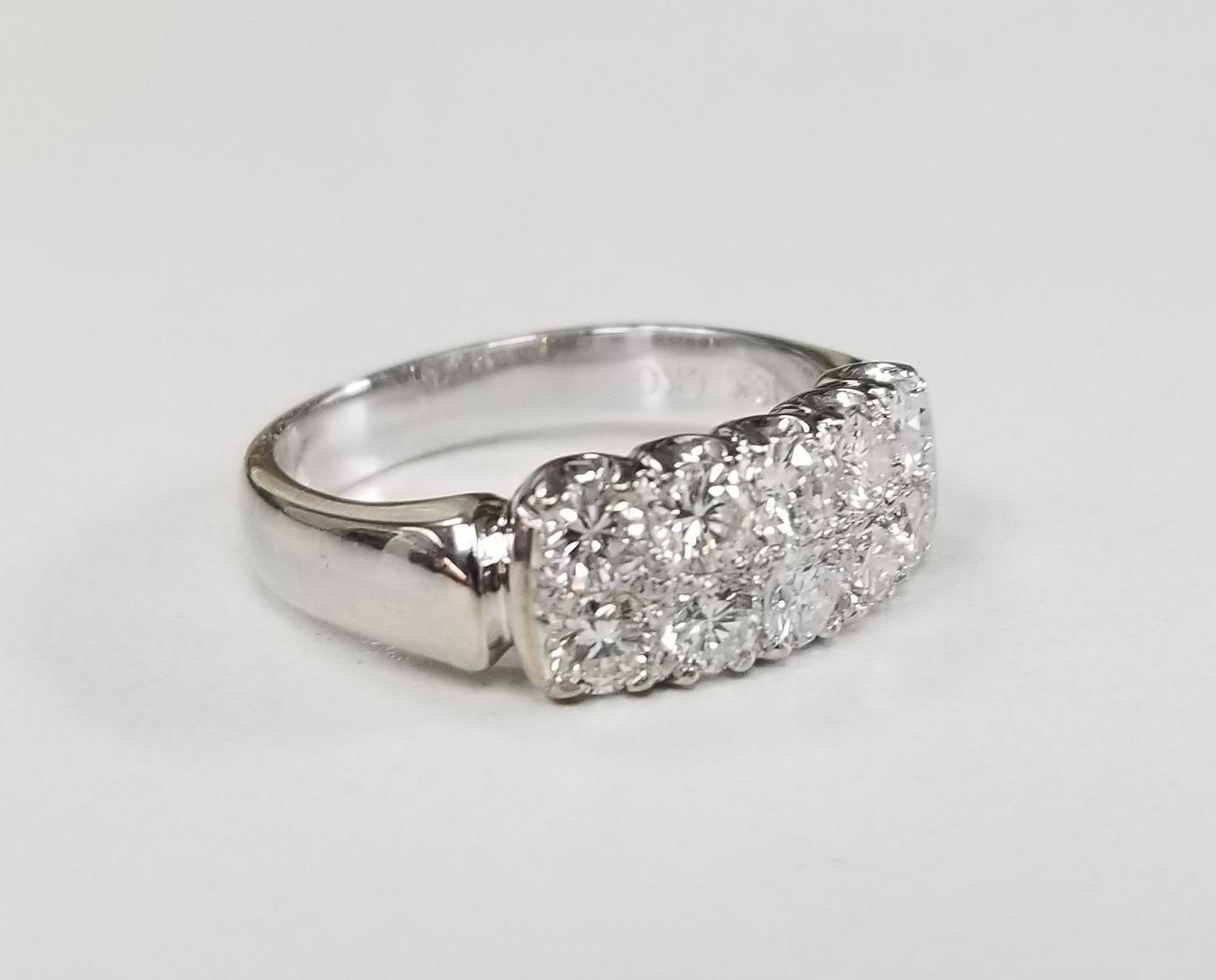 Specifications:
    main stone: ROUND DIAMONDS
    DIAMONDS: 10 PCS
    CARAT TOTAL WEIGHT: APPROXIMATELY 1.10 CTS
    color: G
    clarity: VS
    brand: UNBRANDED
    metal: 18K WHITE GOLD
    type:  RING
    weight: 4.8 GRS 
    SIZE: 6US
 

