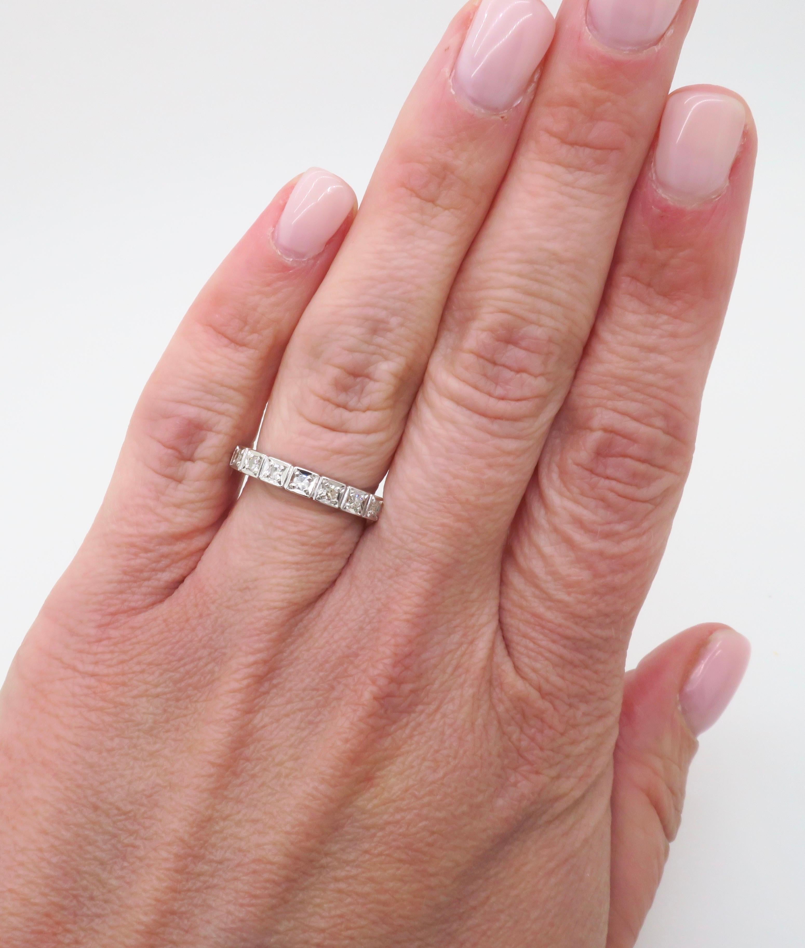 Estate 18k White Gold diamond band. 

Diamond Carat Weight: .18ctw
Diamond Cut: Single Cut Round Diamonds
Color: F-G
Clarity: VS-SI
Metal: 18K White Gold 
Marked/Tested: Stamped 
