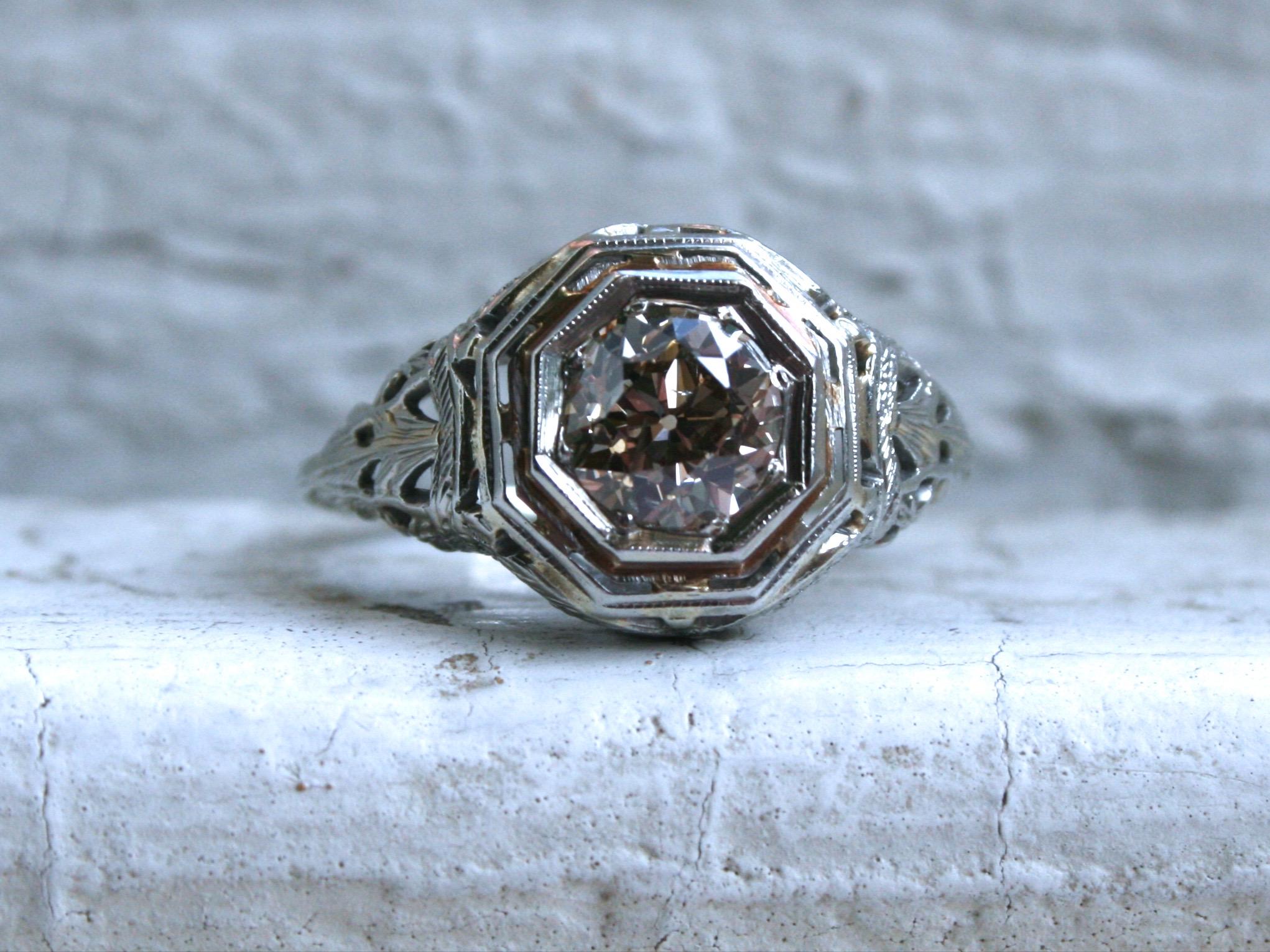 Sigh. I fell in love with this Fabulous Vintage Filigree Diamond Engagement Ring at first glance, and it is gorgeous! It's so hard to find these filigree rings, in such great shape, with such a stunning, big center! Crafted in 18K White Gold, the