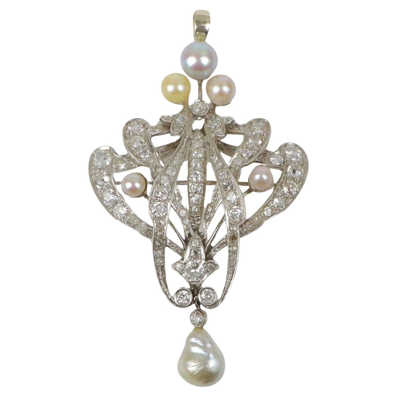 Broche vintage de oro blanco de 18 quilates con diamantes y perlas