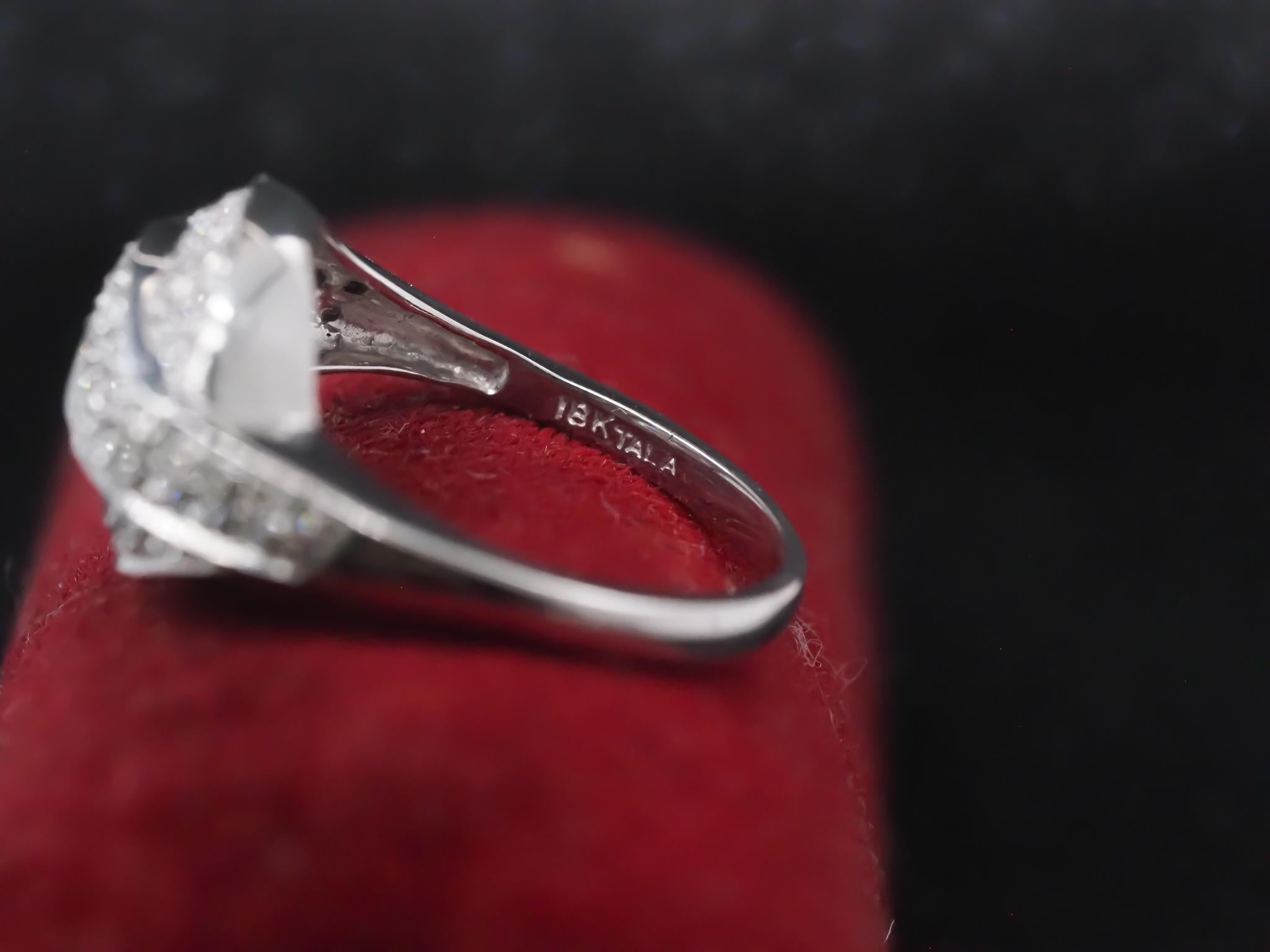 Vintage 18K White Gold Diamond Swirl Ring In Good Condition For Sale In Hicksville, NY