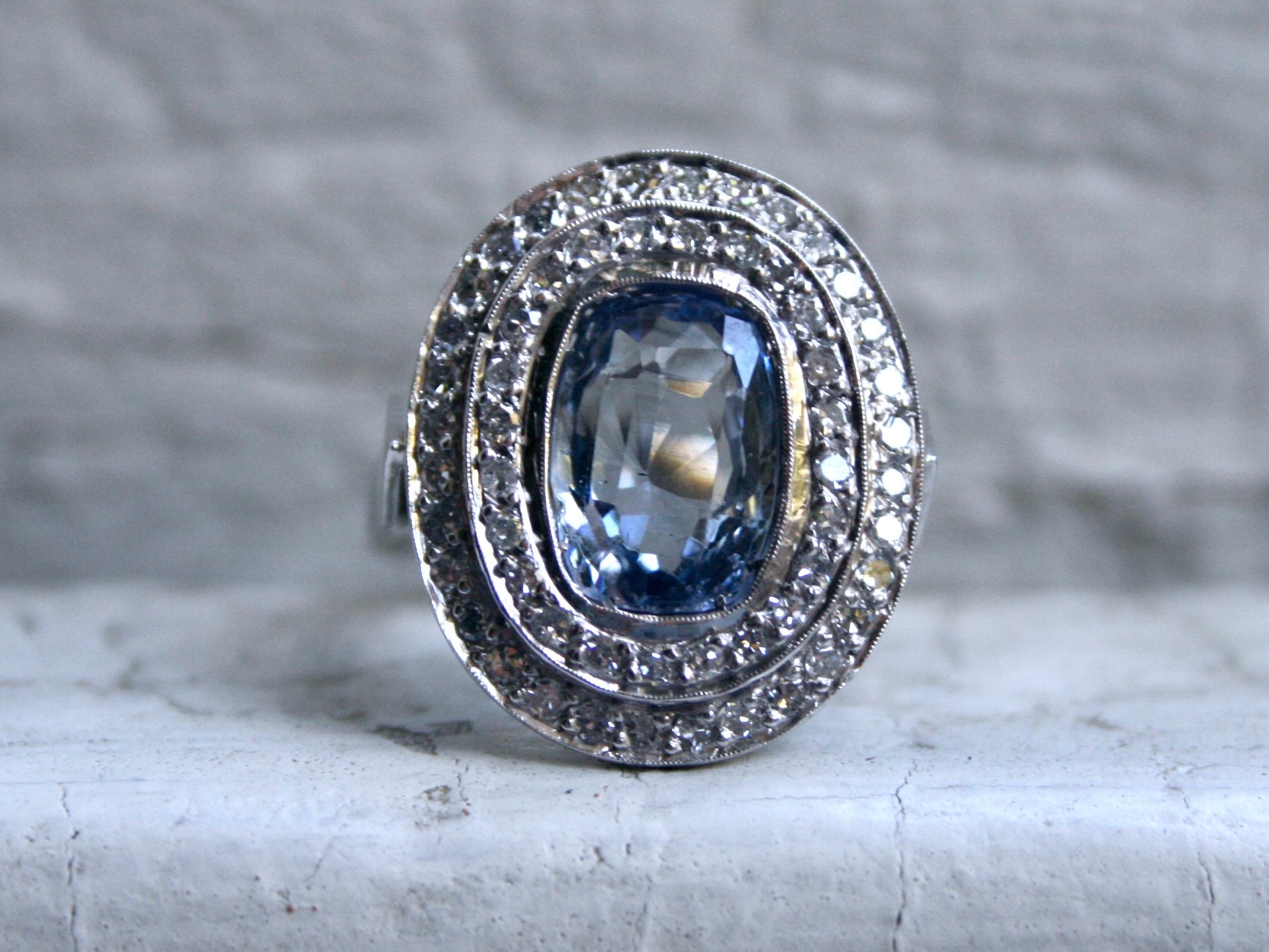 This Vintage Double Diamond Halo and Sapphire Ring is so stunning I'm temped to keep it for myself. The size, the sparkle, the antique styling - this ring has it all!! And despite the current popularity of the halo style, it's a design that's been