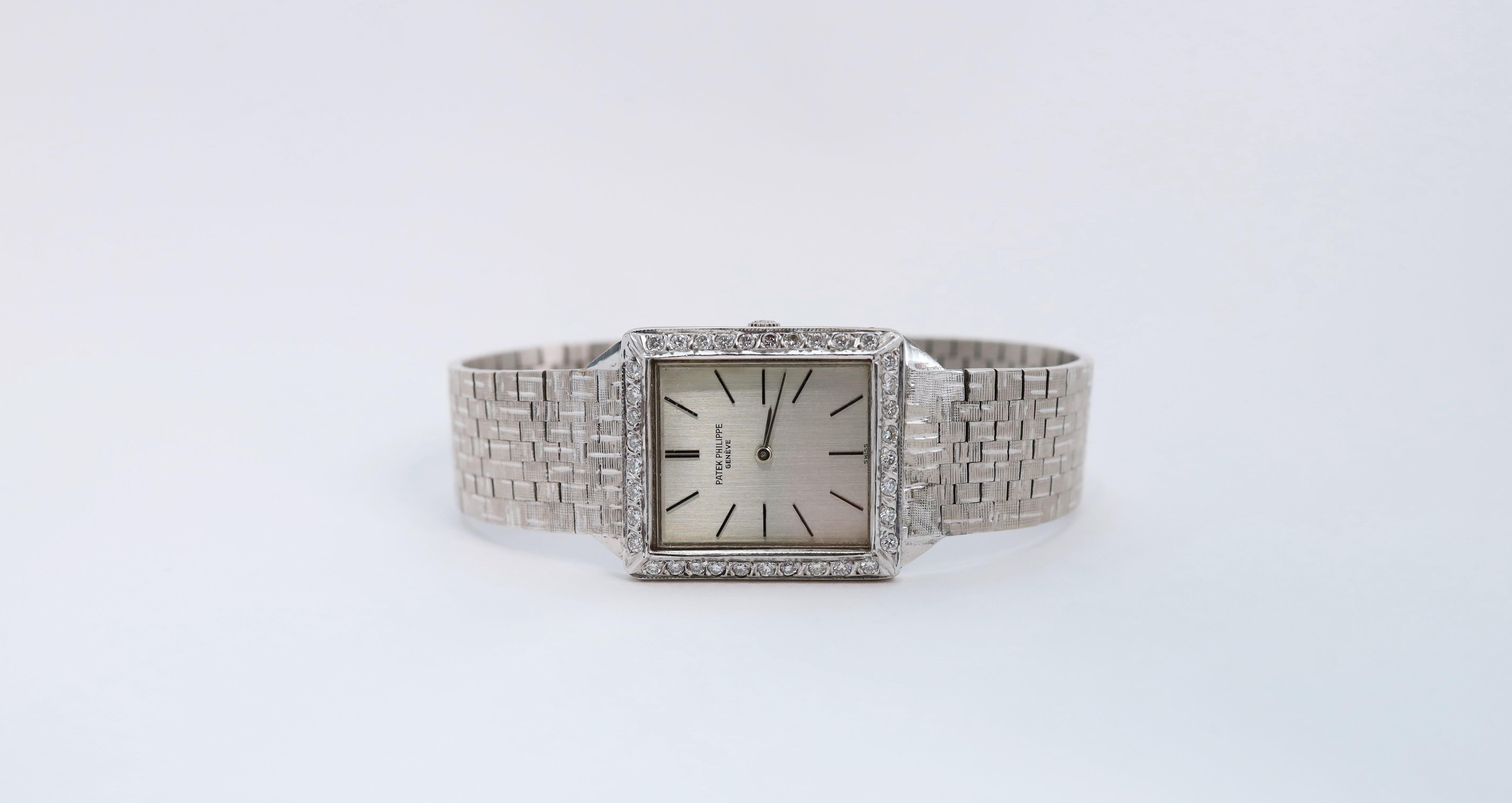 Absolutely stunning, this vintage Patek Philippe Diamond Watch, Reference 3491, is a perfect timepiece for any watch collection. Crafted in a solid 18k white gold, the bracelet features a textured design that is complemented by a bezel featuring 36