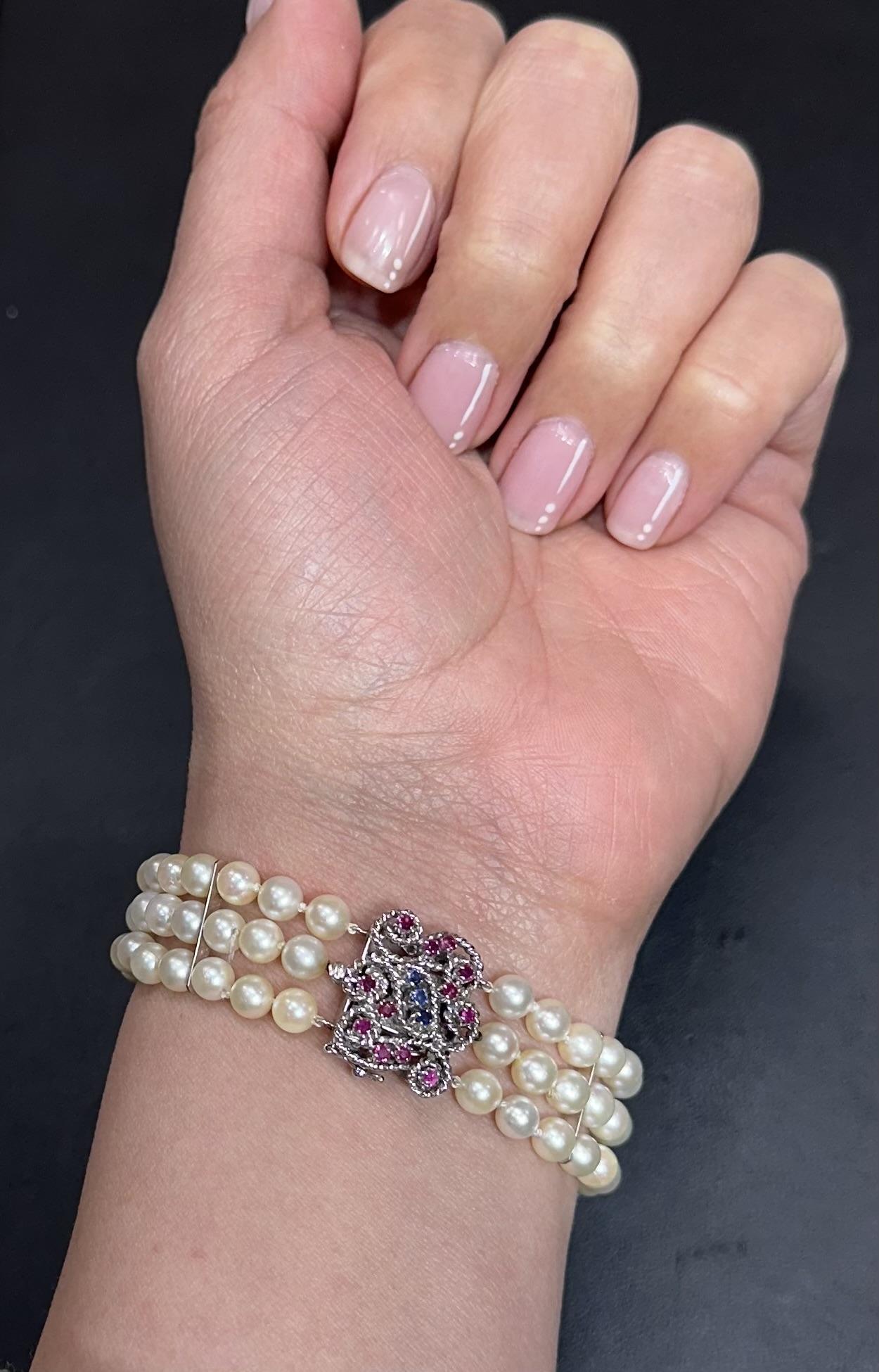 Bead Vintage 18k White Gold Sapphire & Ruby Floral Clasp Three Strand Pearl Bracelet For Sale