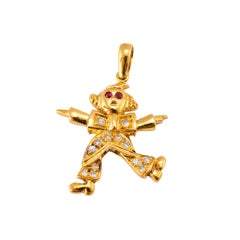 Ciondolo vintage a forma di clown con occhi di rubino e diamanti, in oro giallo 18 carati, 0,31 carati in totale