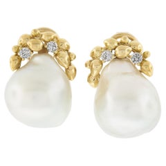 Boucles d'oreilles Omega en or jaune 18K 14mm perles des mers du sud avec 0.20ctw diamants