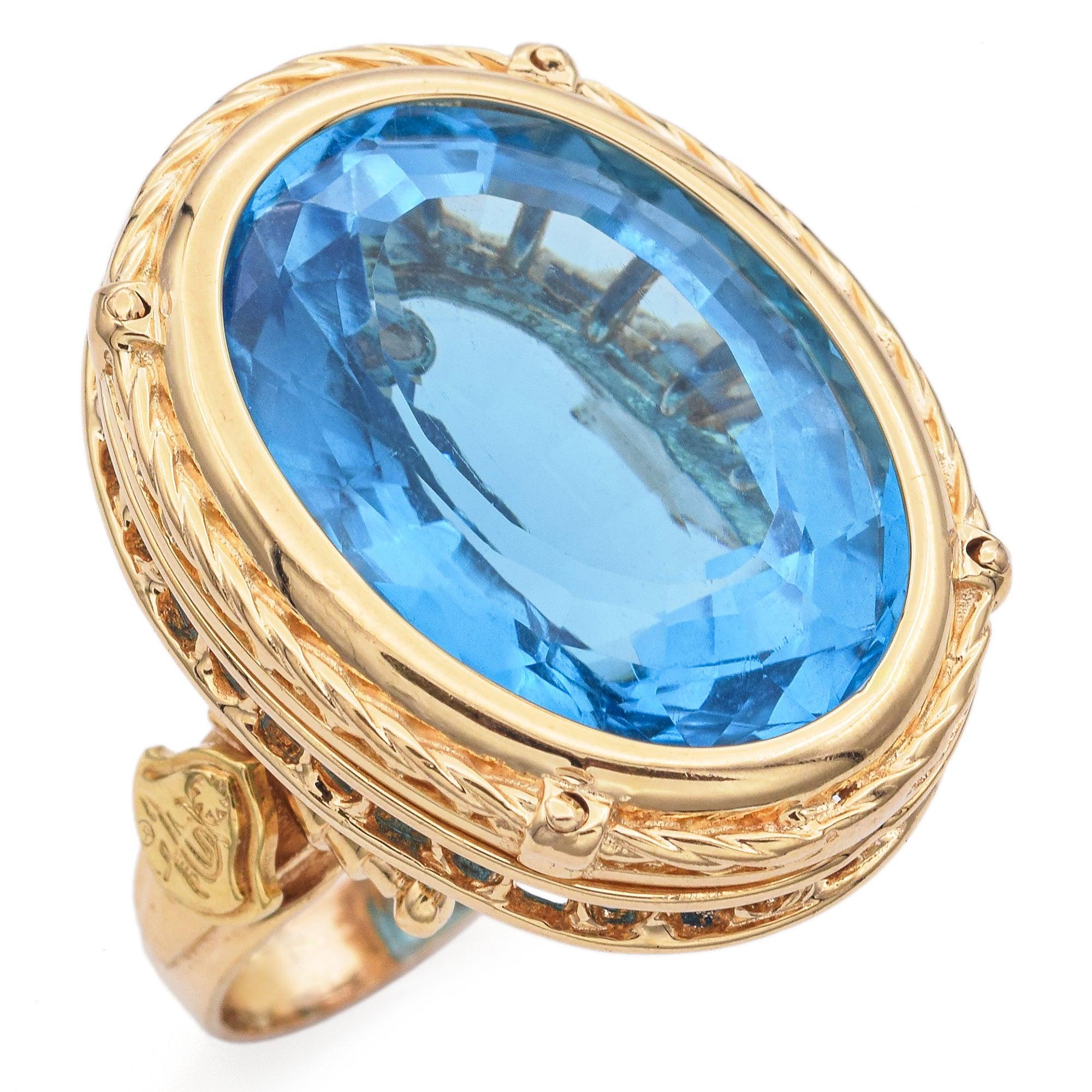 Weight: 23.4 grams
Stone: Approx. 31.63 Ct Blue Topaz, (22.5 x 16.5 x 12 mm)
Face of Ring: 28.7 x 23 mm
Ring Size: 7.5
Hallmark: 750, Italy

ITEM #: BR-1311-060624-17