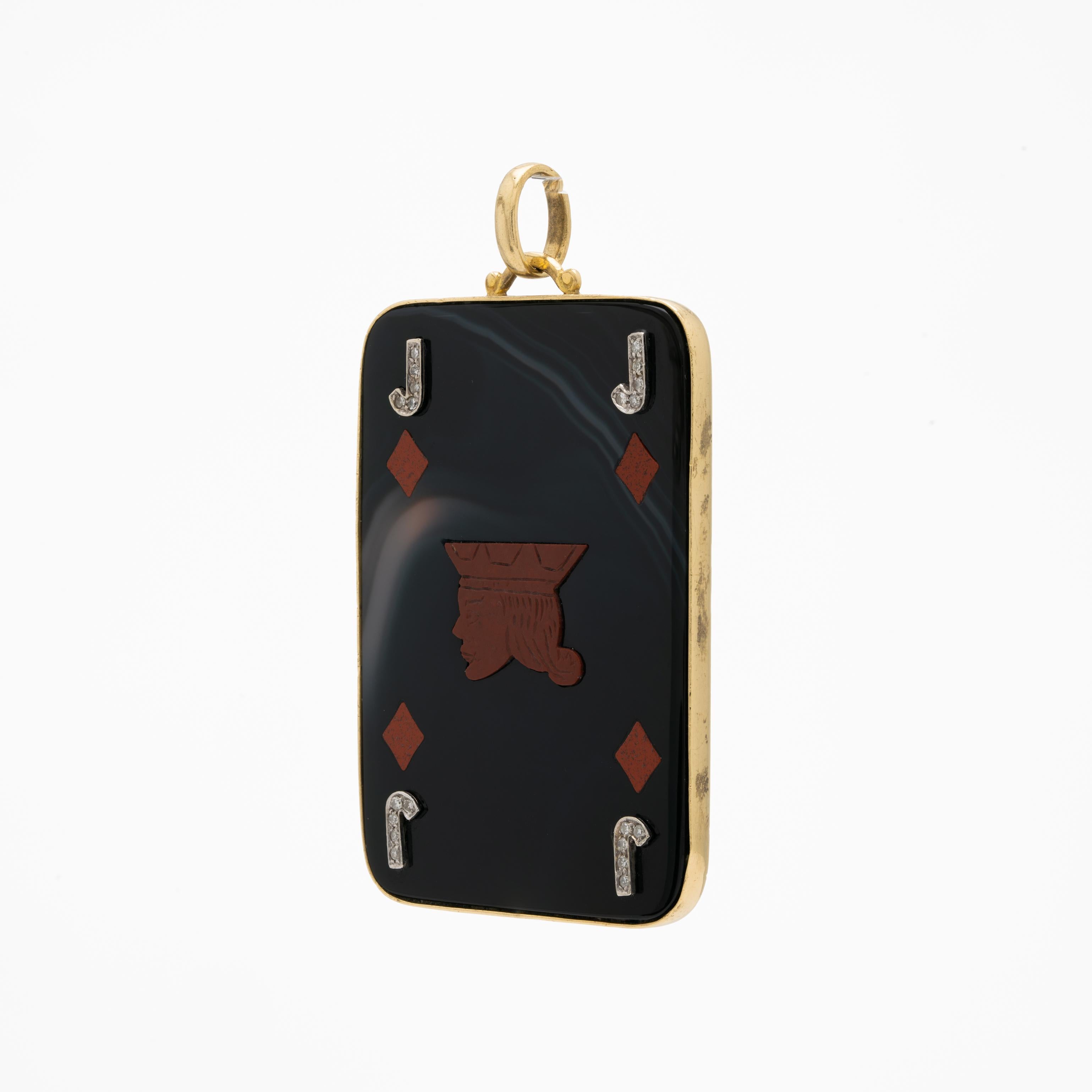 Vintage 18k Yellow Gold, Agate and Carnelian Jack of Diamonds Pendant c.1970s

According to those who ascribe tarot-like meaning to ordinary playing cards, the Jack of Diamonds represents a drive and craftiness in all financial endeavors. This