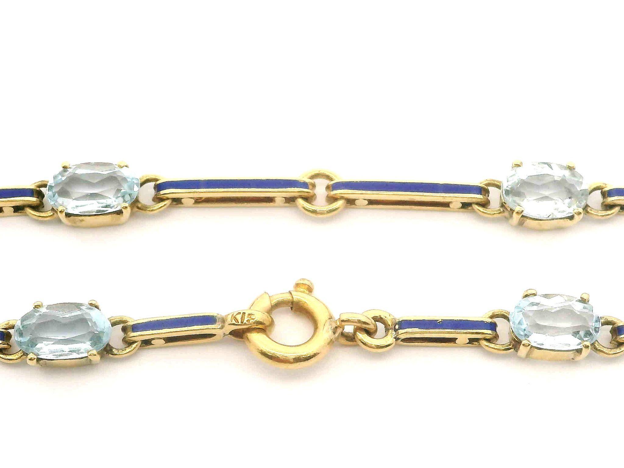 --Stone(s):--
(6) Natural Genuine Aquamarines - Oval Cut - Sky Blue Color  - 6x4mm - 2.40ctw (approx.)

Material: Solid 18K Yellow Gold & Blue Enamel Work
Weight: 5.40 Grams
Chain Type: Alternating Aquamarine & Enamel Bar Links
Chain Length: