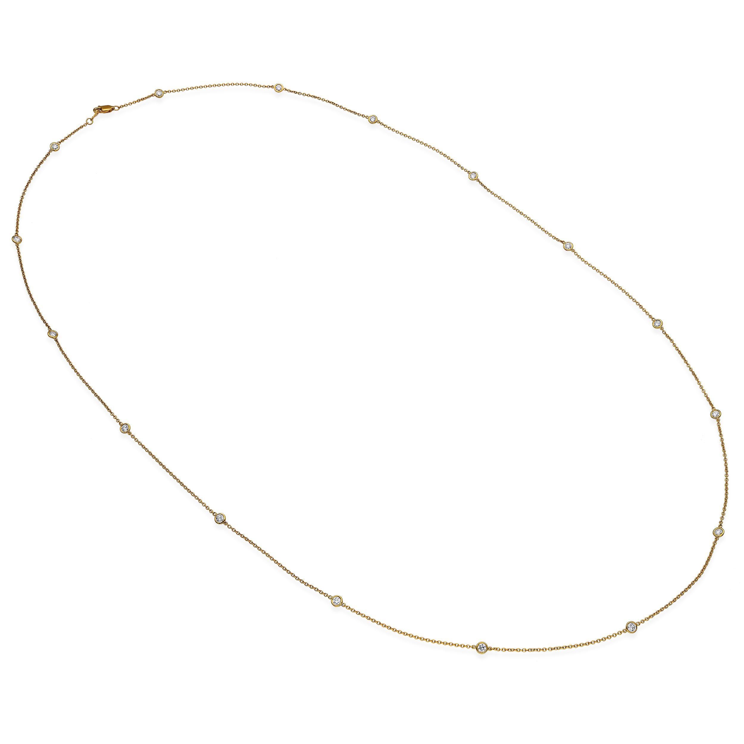 Collier à maillons en or jaune 18k et diamants, réalisé en or jaune 18k avec une série de maillons accentués de diamants élégamment placés tout au long du design. Les maillons en or poli s'enchaînent sans heurt, créant un look raffiné qui allie