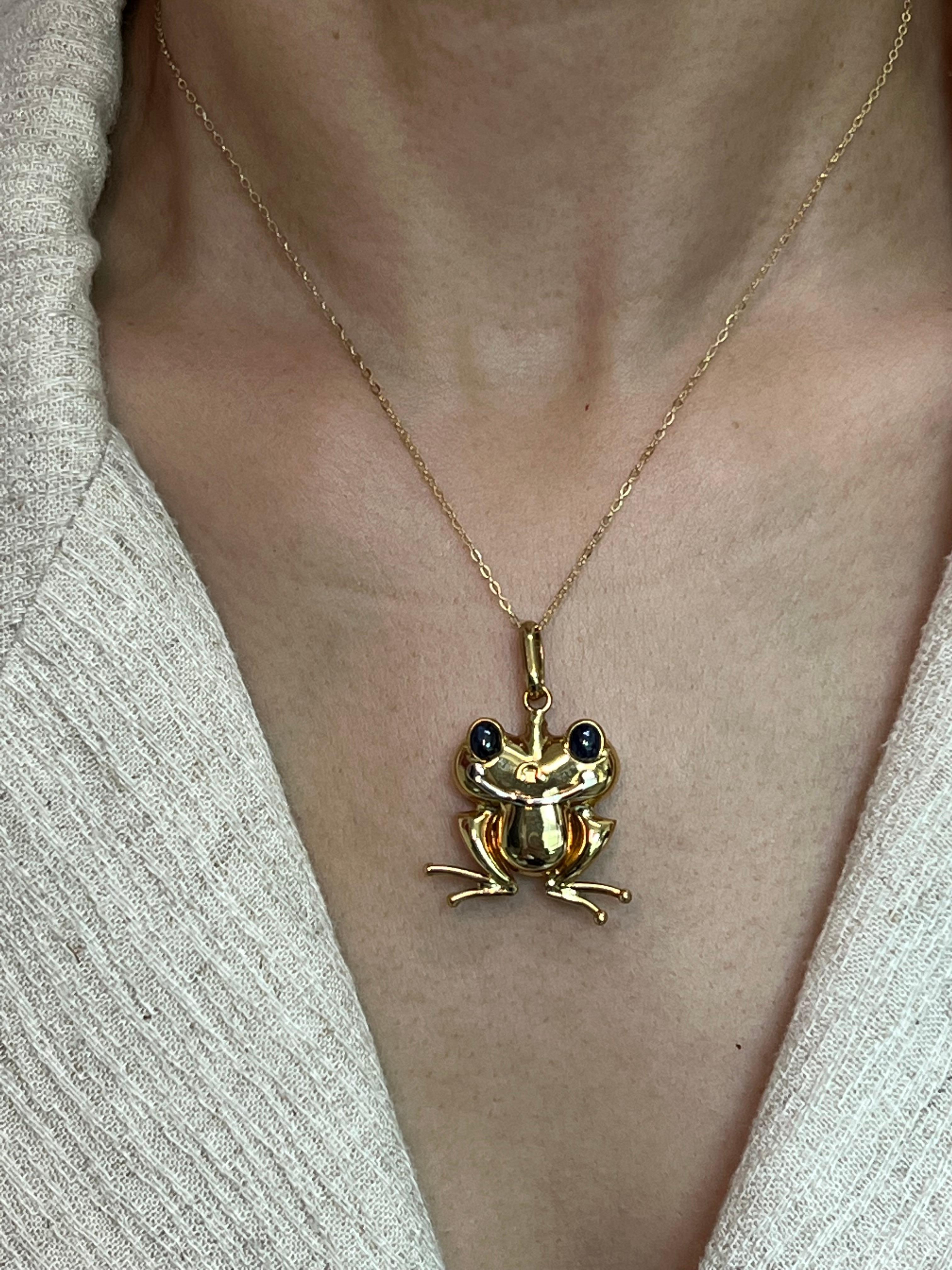 Please check out the HD video! Here is a unique and fun unisex pendant that is also suitable for kids. The pendant is set in 18k yellow gold with 2 larger sapphires as eyes. This fun pendant will get you lots of complements. An 18k yellow gold chain