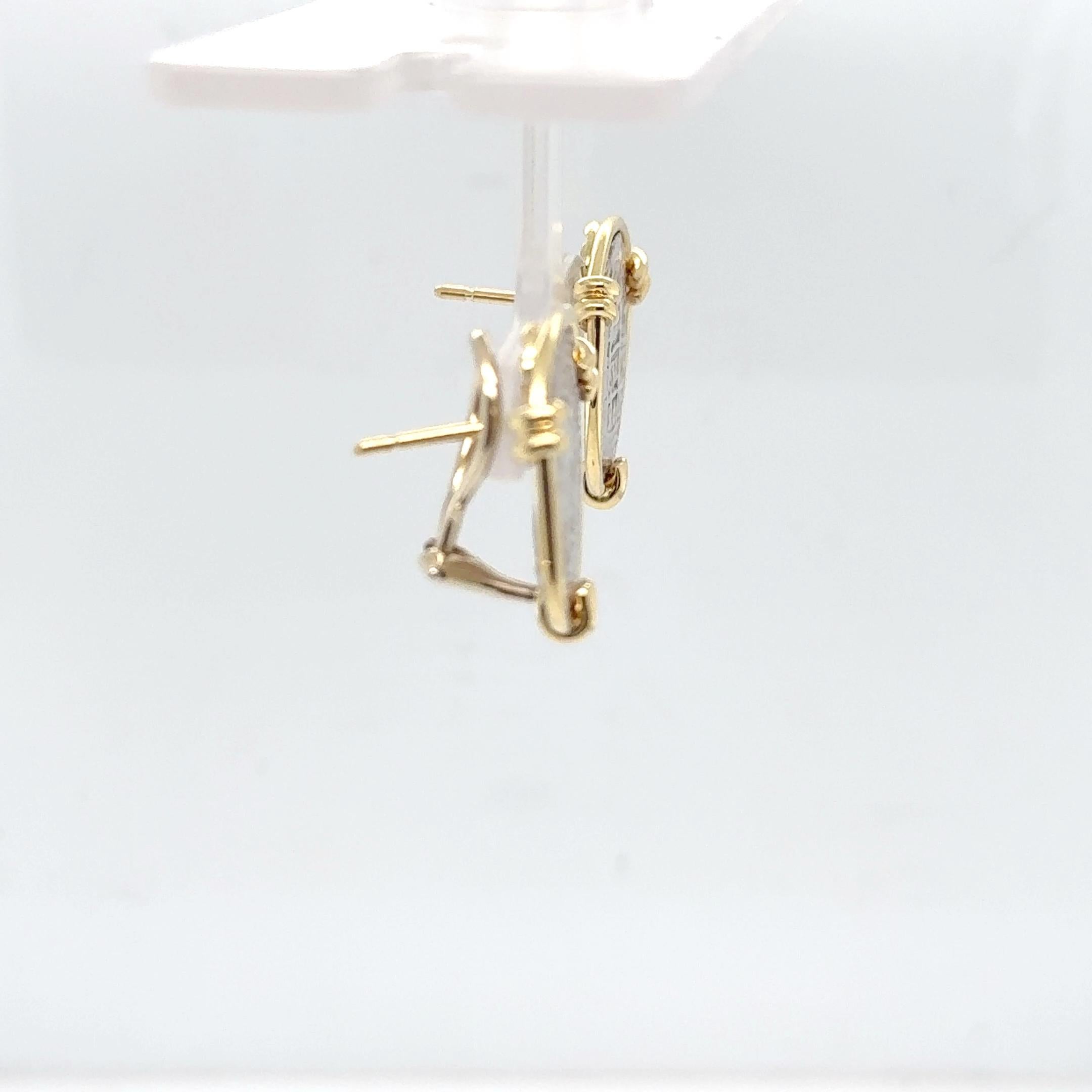Celebrate the grandeur of ancient civilizations with these striking ancient coin drop earrings, expertly crafted in a timeless blend of 18 karat yellow gold and oxidized sterling silver. Measuring approximately 21mm in diameter, these two-tone coin