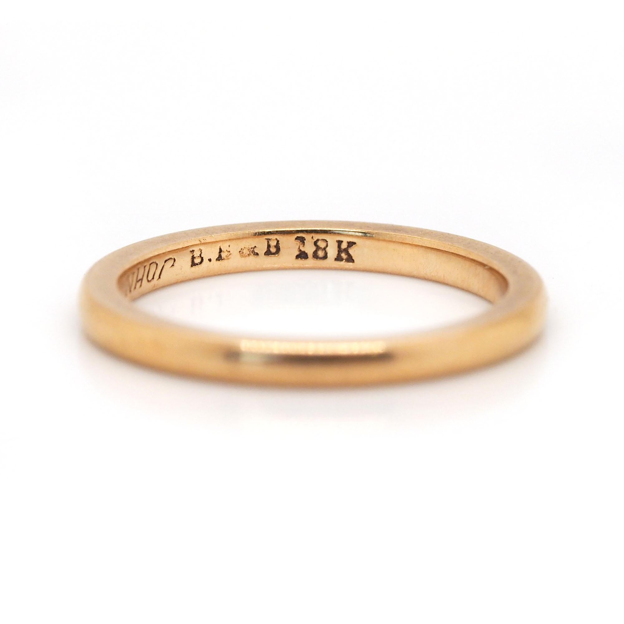 This is a Vintage Pre-Owned Bailey Banks and Biddle 18k Yellow Gold Thin Ladies Wedding Band from the 1920's.  Please review the following details on this beautiful piece.  The band measures 1.8mm in thickness and is a ring size 4 1/2.  It is