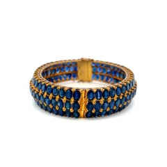Vintage 18K Yellow Gold Bangle Bracelet with 75 Carat Oval Sapphires Size 7