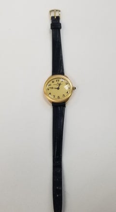 Vintage 18k Yellow Gold Baume & Mercier with Arabic Numbers Gold Dial on a Strap