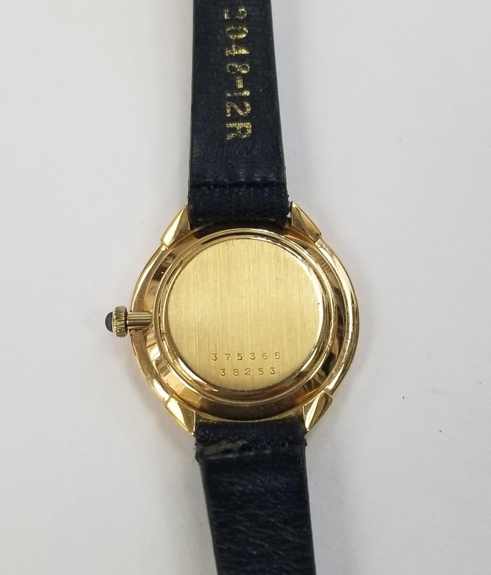 Vintage 18k Yellow Gold Baume & Mercier with Arabic Numbers Gold Dial on a Strap In Excellent Condition For Sale In Los Angeles, CA