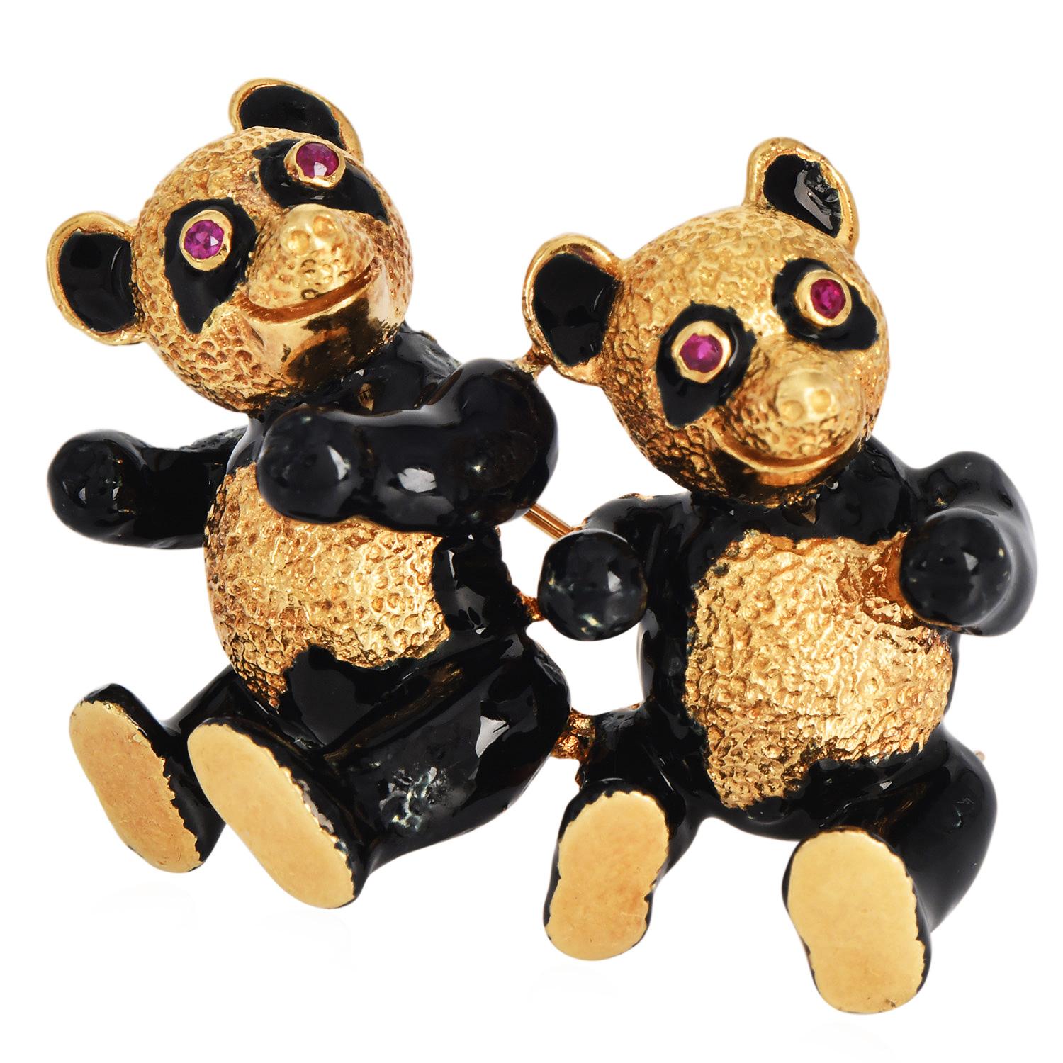Vintage 18K Yellow Gold Black Enamel Dancing Bear Brooch

Add a touch of whimsical charm to your jewelry collection with this delightful vintage brooch featuring two dancing bears. Crafted in luxurious 18K yellow gold, the brooch showcases a