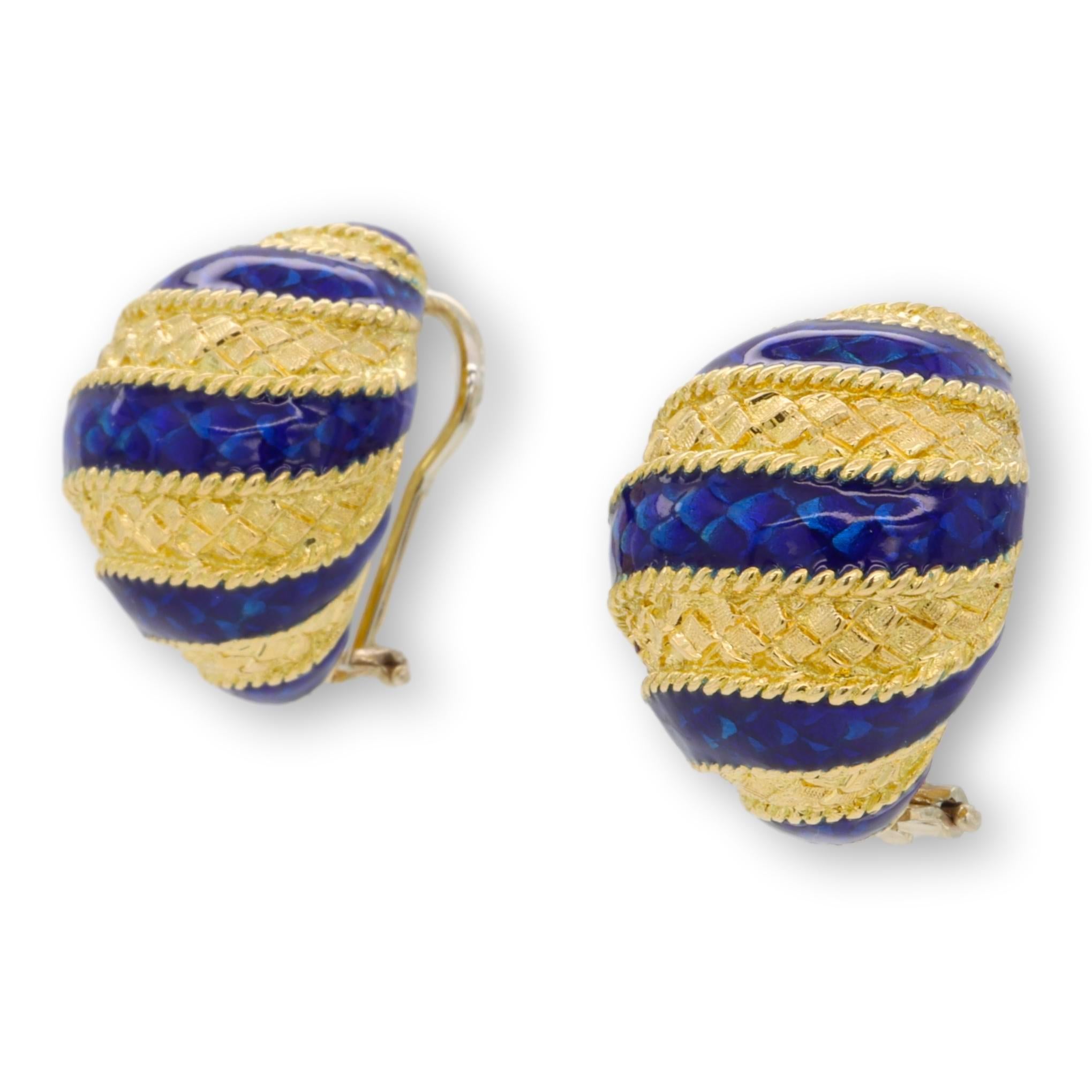 Pair of chunky domed vintage earrings  finely crafted in 18 karat yellow gold featuring a ribbed lattice textured design complemented by smooth blue enamel stripes inside knotted gold details. Earrings have large omega back closures and posts. The
