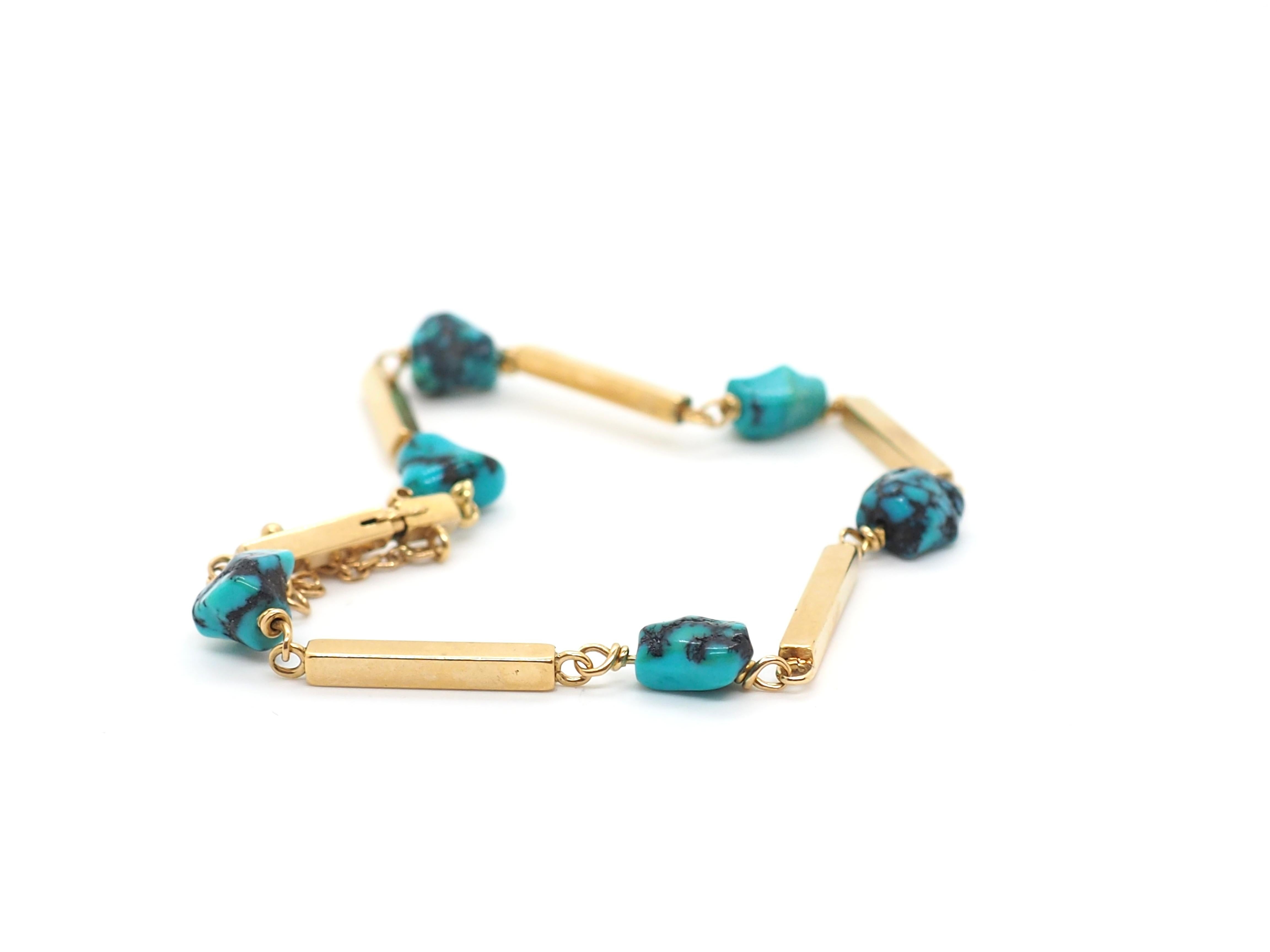 Indulge in the timeless allure of this vintage 18K yellow gold bracelet, adorned with six stunning turquoise stones. 
Each gemstone exudes natural beauty and elegance, perfectly complementing the luxurious gold setting. 
Handcrafted with meticulous
