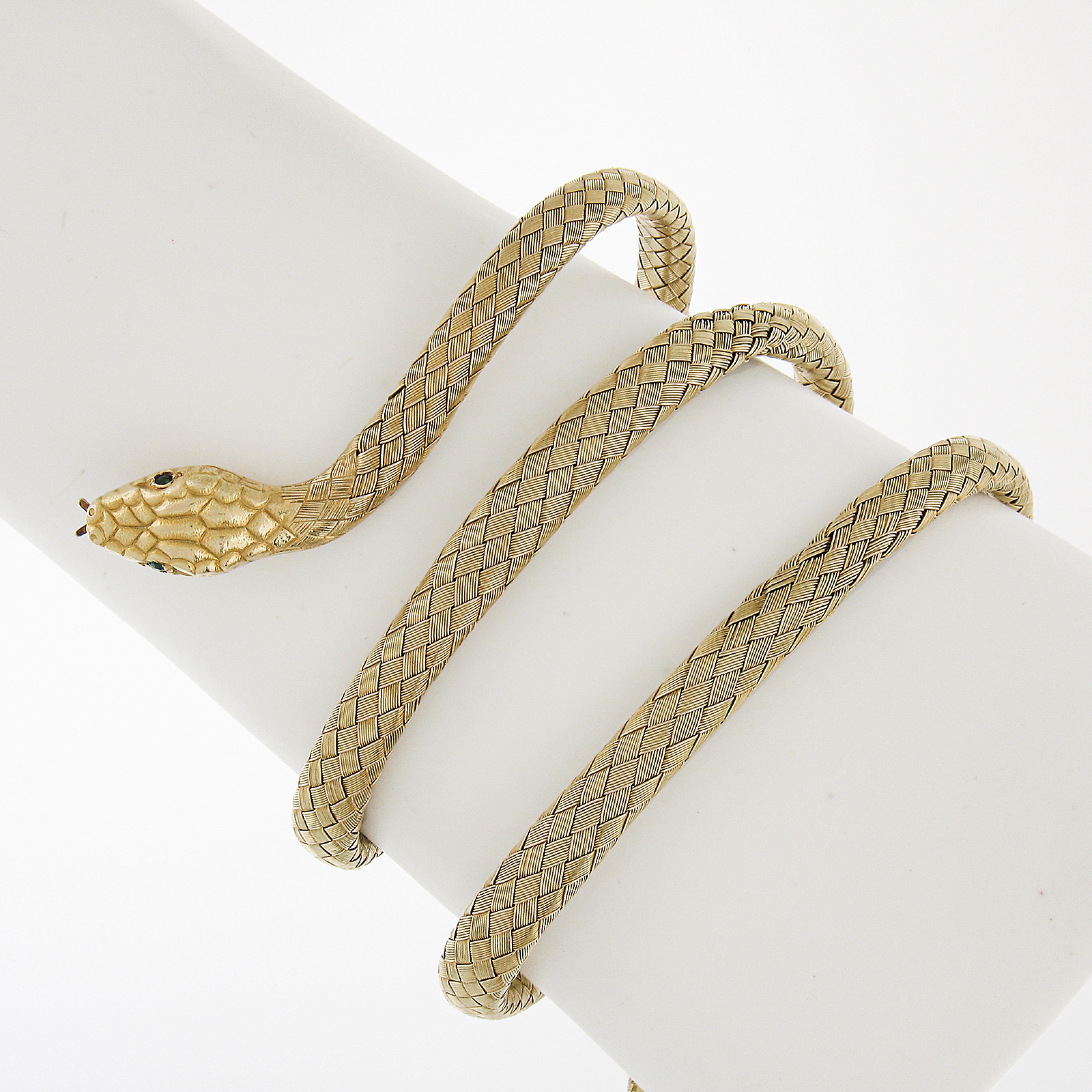 --Stone(s):--
(2) Natural Genuine Emeralds - Round Cut - Pave Set - Vivid Green Color

Material: Solid 18k Yellow Gold
Weight: 32.72 Grams
Type: Wrap Wrist Bangle
Length: Will comfortable fit a 7.25 inch wrist at Smallest. Due to its Flexibility it