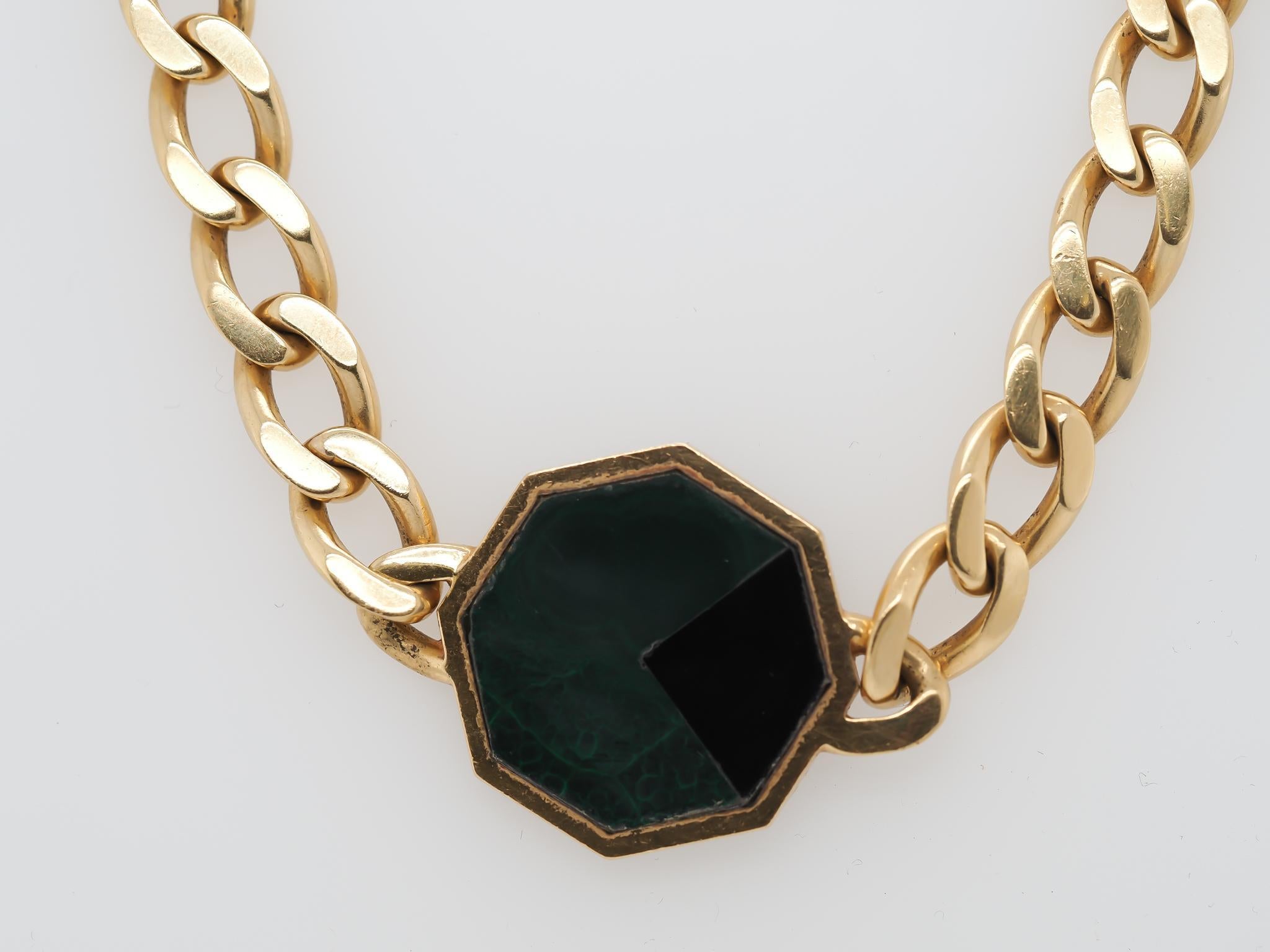 Year: 1970s
Item Details:
Metal Type: 18K Yellow Gold [Hallmarked, and Tested]
Weight: 84.3 grams
Stone Details: Malachite & Onyx
Hallmarks: Stamped with Serial Numbers, Cartier Marks, Import Marks, and Purity Stamps.
Measurement: 16.5
