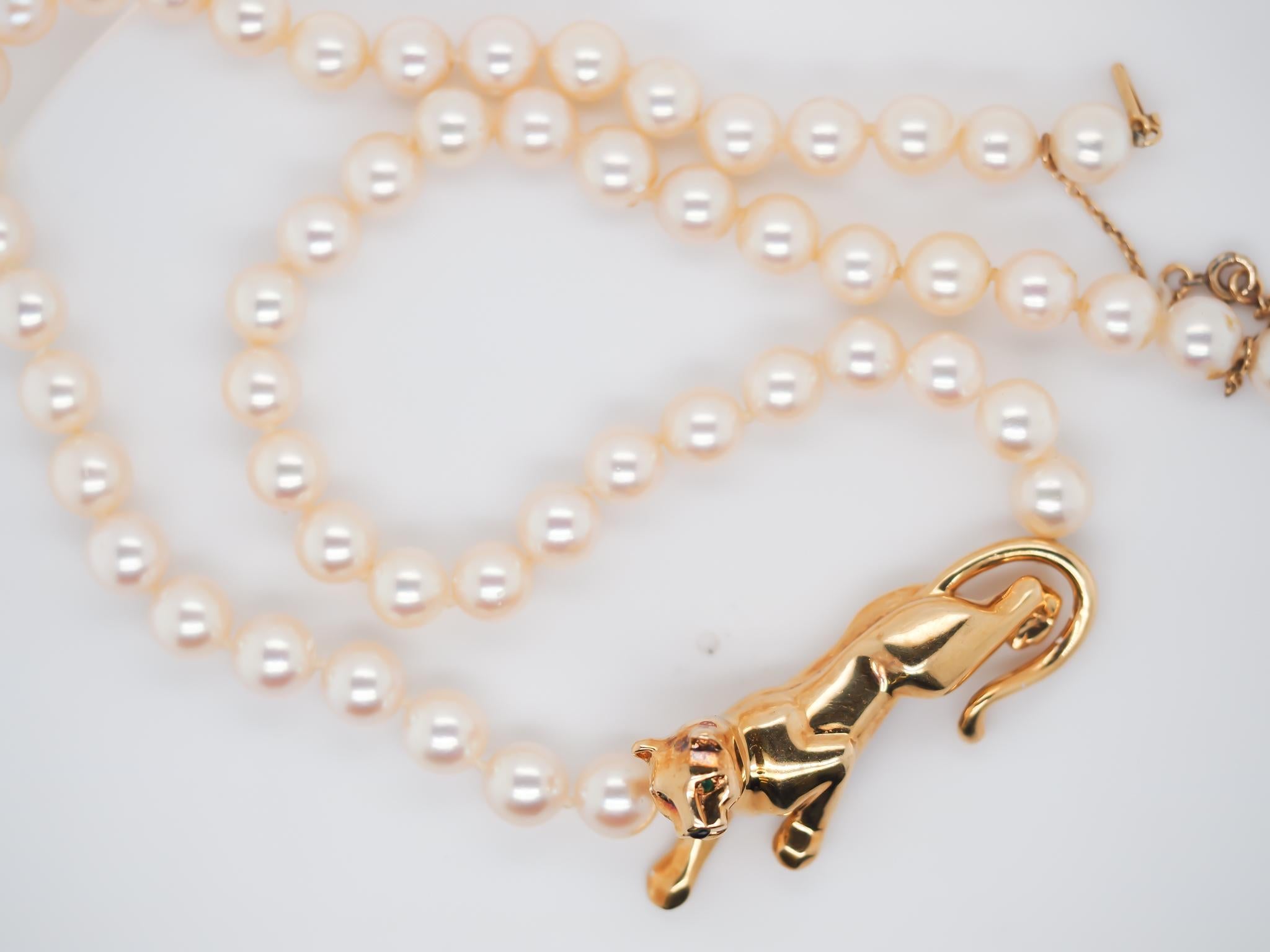 Year: 1980s

Item Details:

Maker: Cartier, signed on panthers with serial number and on the clasp.

Metal Type:18K Yellow Gold [Hallmarked, and Tested]
Weight: 48.9 grams

Pearl Strand Details 18.5 inch long, 7.2mm, Pinkish White Luster

Condition: