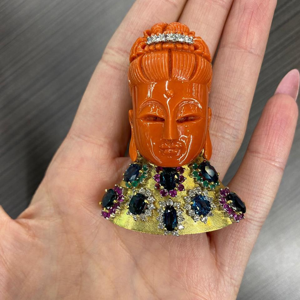 Magnificent 18K Yellow Gold Carved Coral Diamond Sapphire Brooch Pin Pendant

Estate 18K yellow gold diamond sapphire and carved coral brooch / pendant. This magnificent piece features a carved coral Buddha, sapphires and brilliant round diamonds.