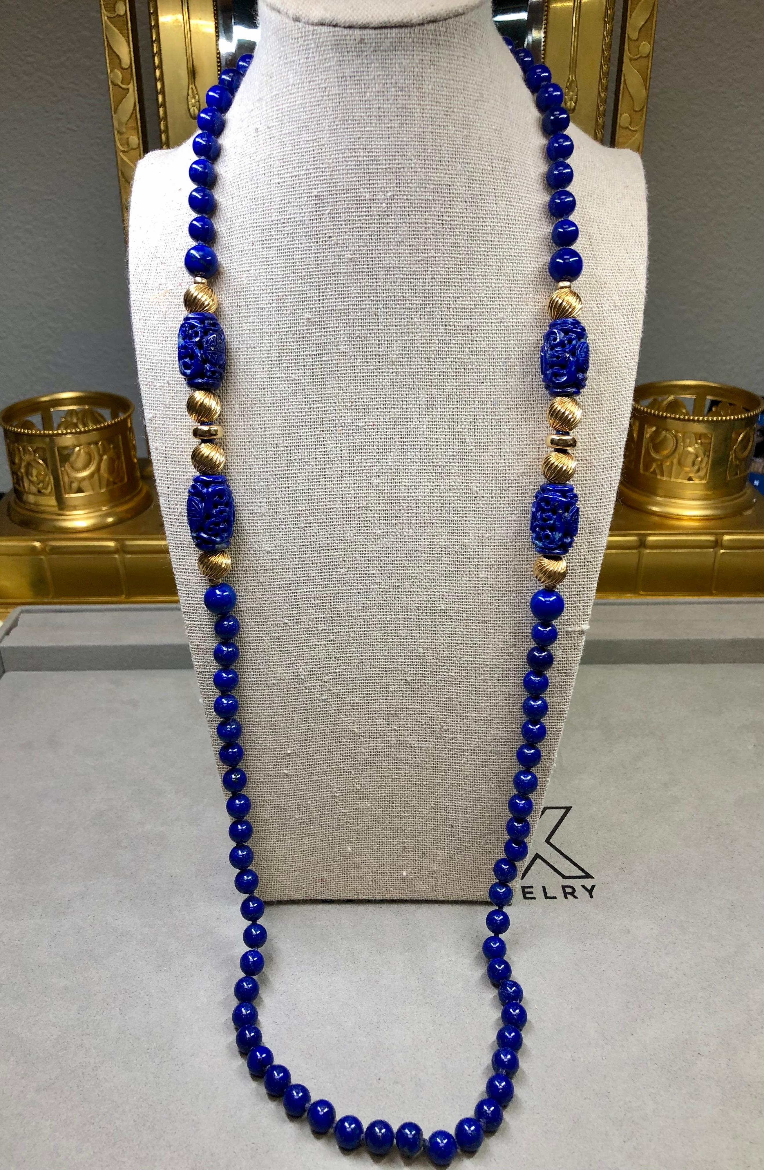 An intricately carved lapis necklace c. the mid-1950’s finished with textured 18K yellow gold rondel separators. No attention to detail was spared in the making of this. The level of craftsmanship and expertise necessary to produce these carvings
