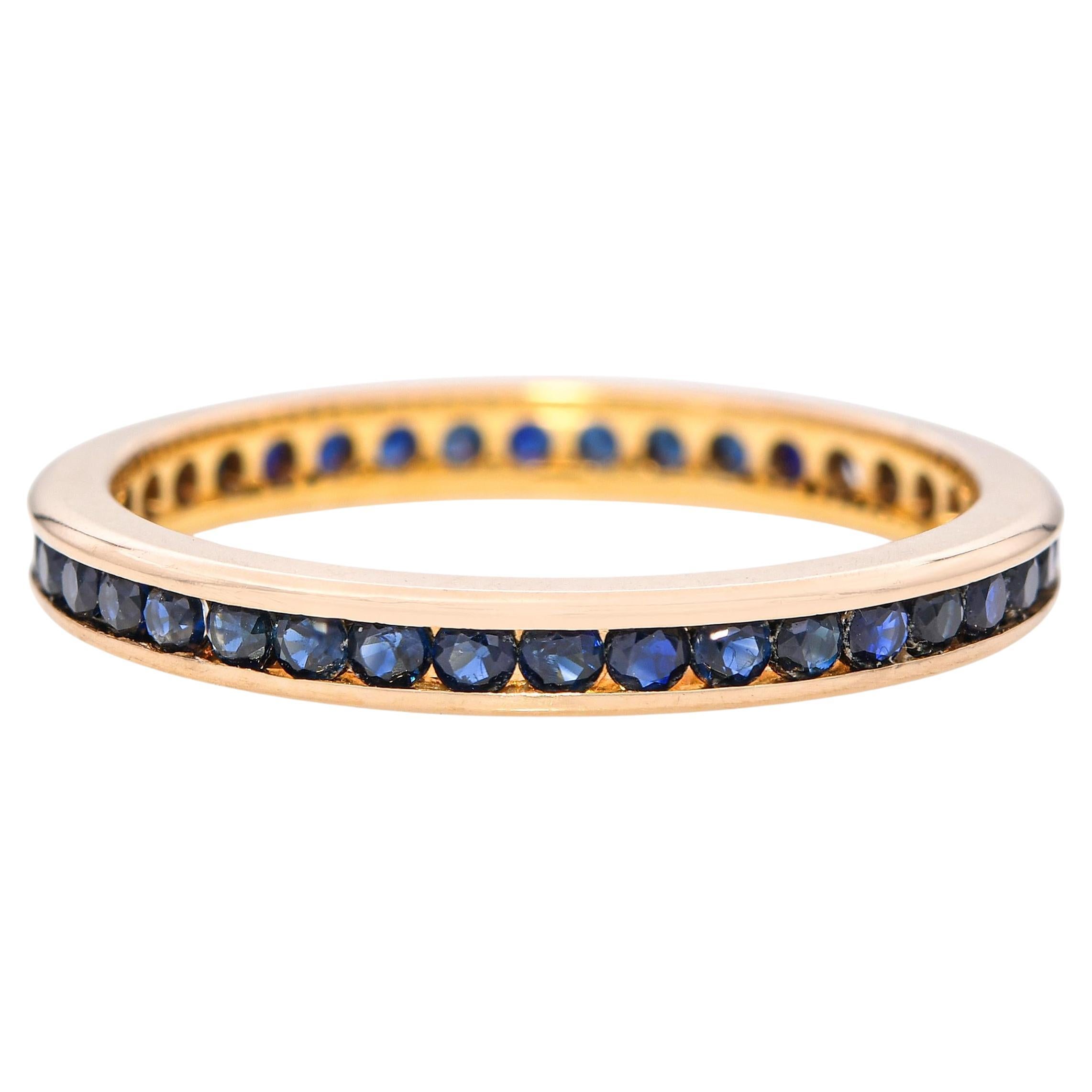 Vintage 18k Yellow Gold Channel Set Sapphire Eternity Band For Sale