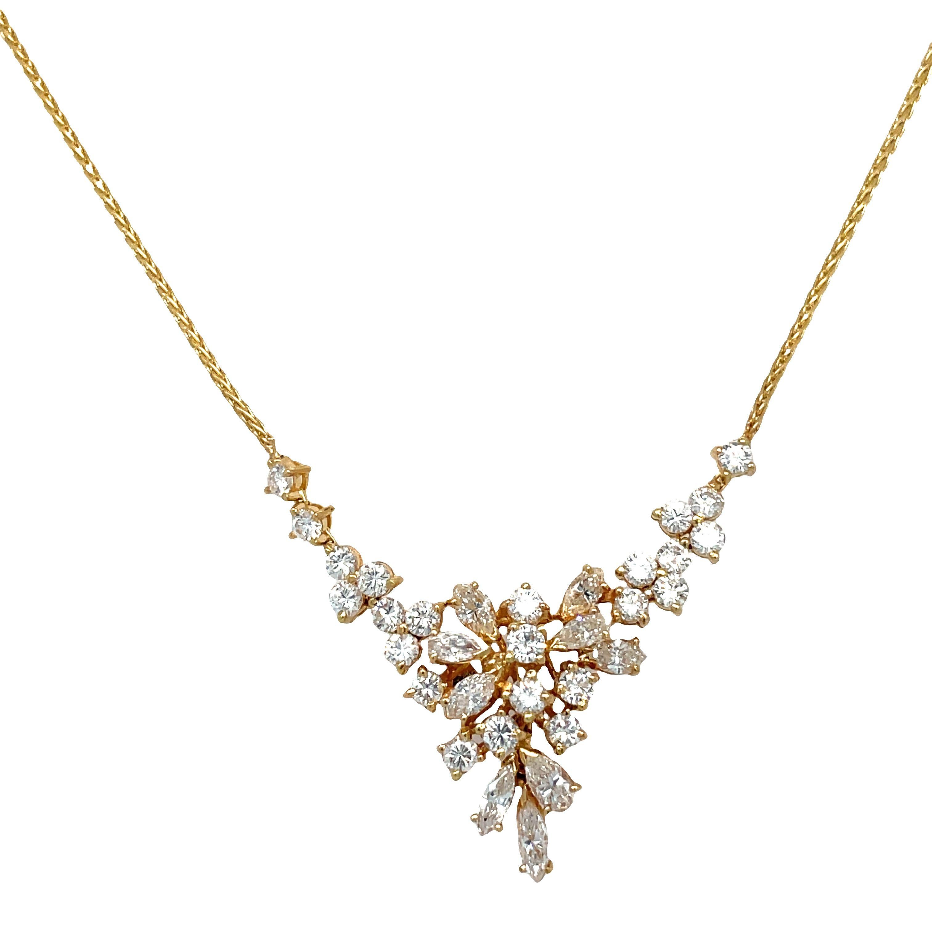 Introducing this exquisite diamond scatter statement necklace, designed to leave a lasting impression of elegance. Crafted in 18k yellow gold, this one-of-a-kind beauty features a dazzling array of radiant 3.50 carats diamonds that appear to