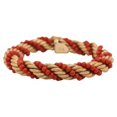 Bracelet tressé vintage en or jaune 18 carats avec perles de corail
