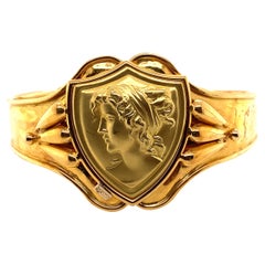 Vintage 18K Yellow Gold Cuff Bracelet with Woman Figure on a Shield