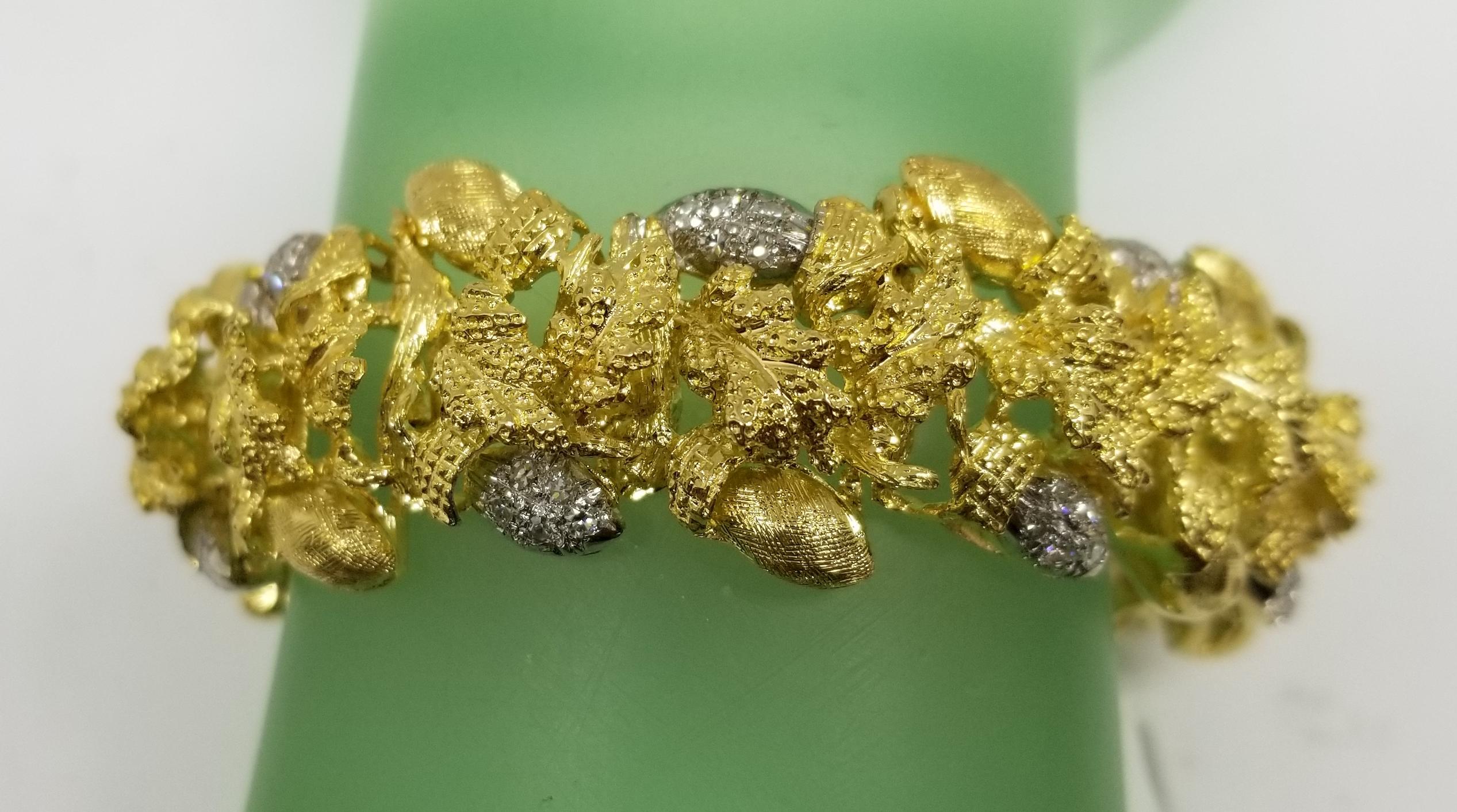 Circa 1960s Vintage 18k yellow gold diamond acorn and leaf bracelet, containing 70 round single cut diamonds; color 