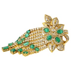 Broche vintage de oro amarillo de 18 quilates con diamantes y esmeralda verde con motivo floral