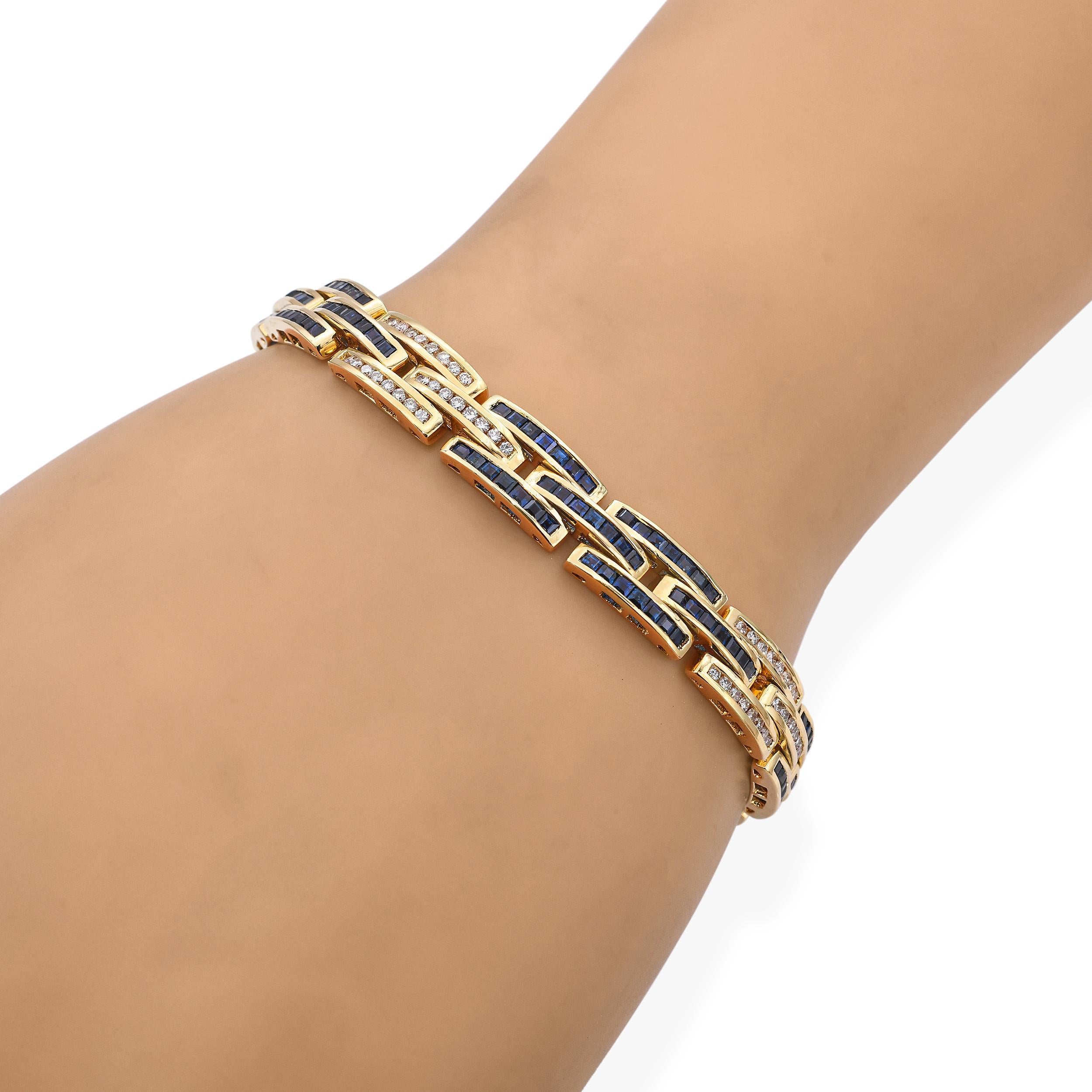 Taglio brillante Bracciale d'epoca in oro giallo 18 carati con diamanti e zaffiri incastonati a canale A Link in vendita