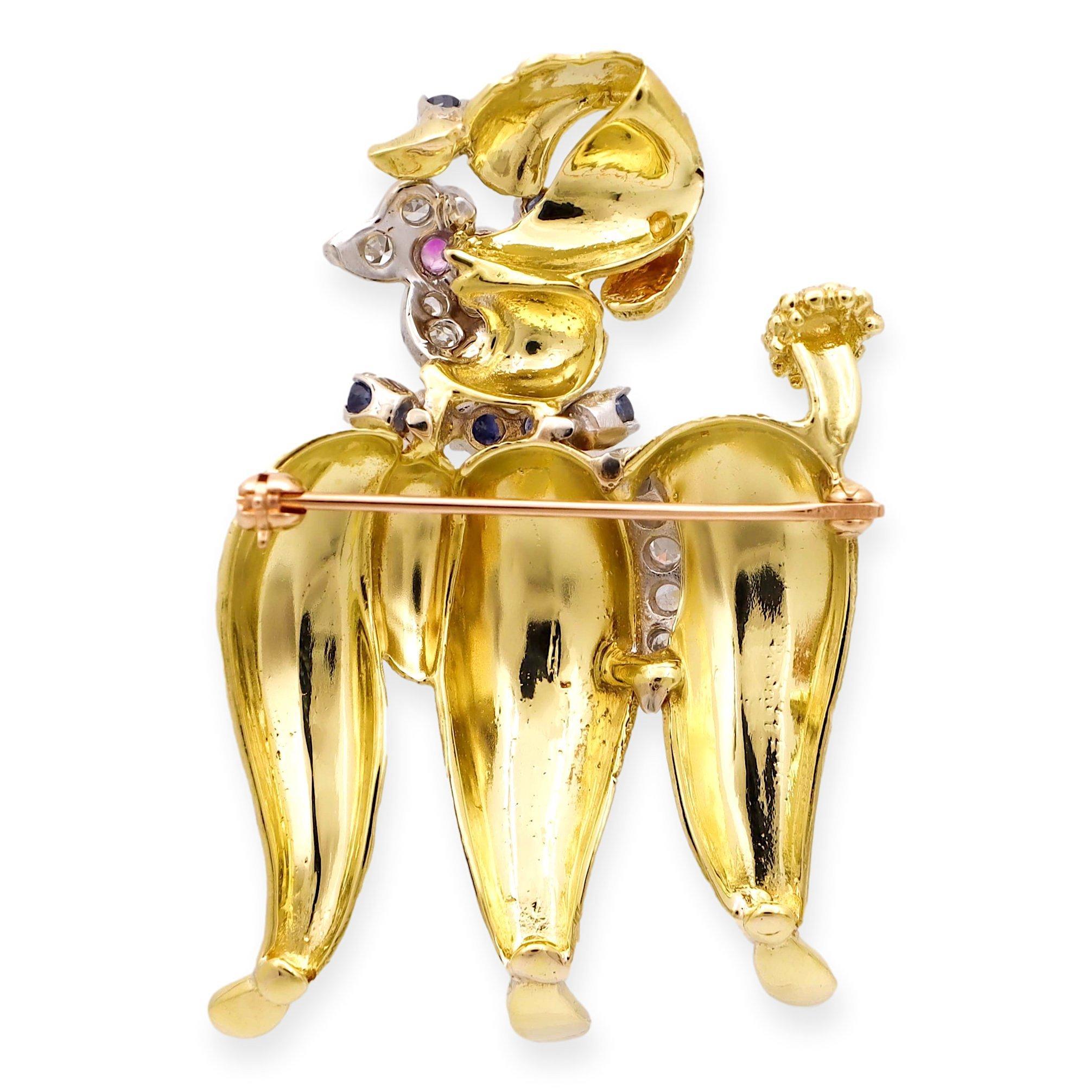 Vintage Poodle Motif Brooch, a delightful piece finely crafted in 14 karat yellow gold. This charming creation showcases a playful poodle motif adorned with a mix of single-cut diamonds, vibrant blue and pink sapphire embellishments, all set atop