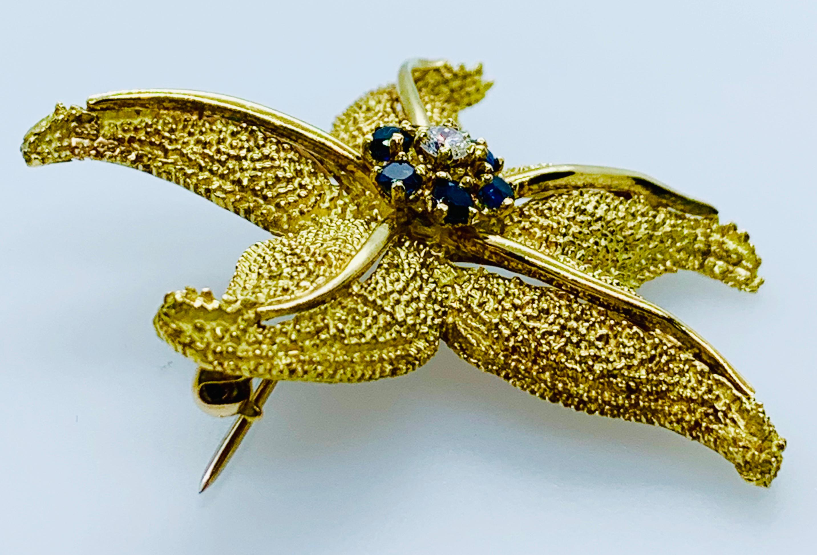 Contemporary Vintage 18 Karat Yellow Gold Diamond and Blue Sapphire Starfish Brooch