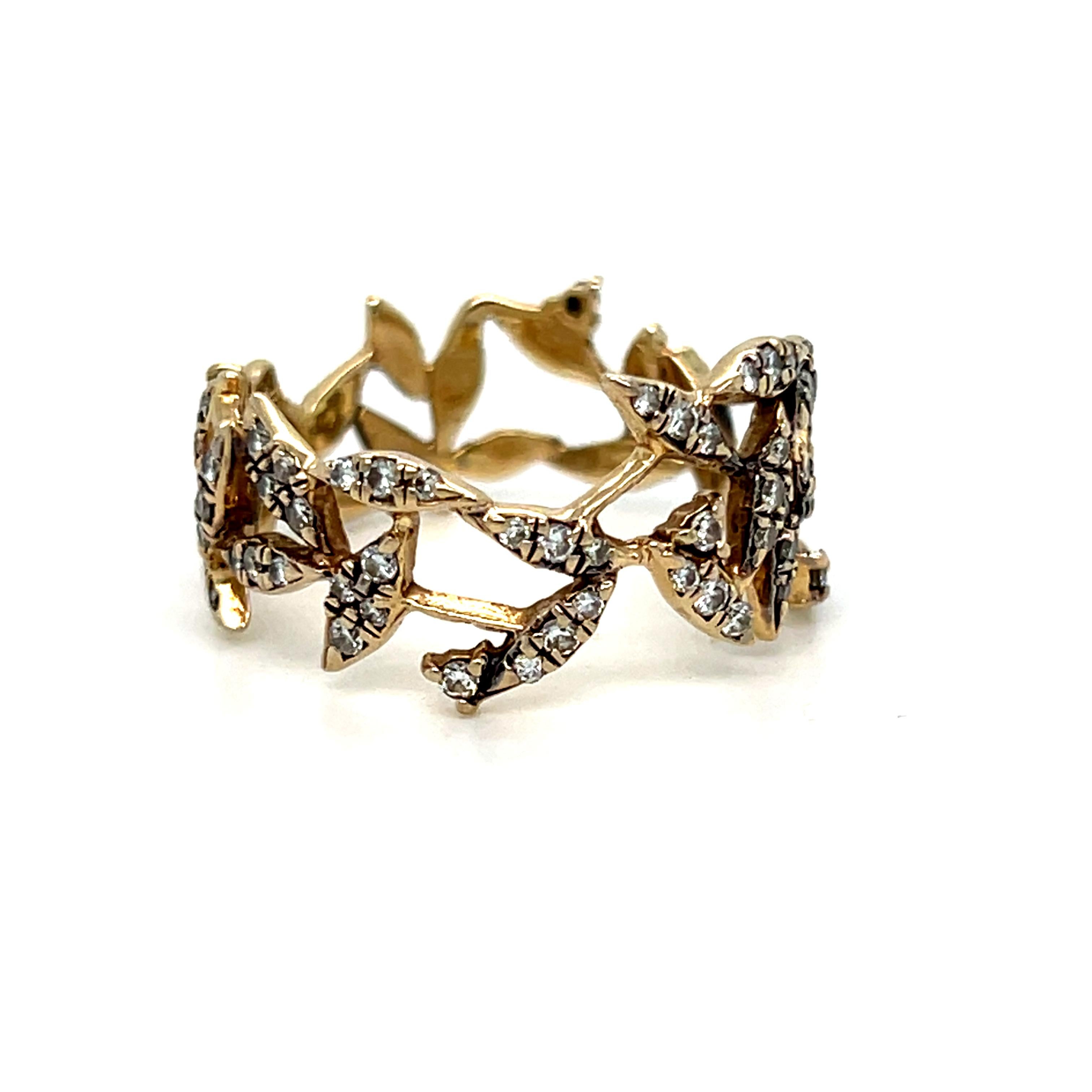 Dieser wundersch�öne Vintage Diamond Eternity Band Ring ist wirklich ein besonderes Stück, hergestellt von einem besonderen Hersteller - H. Stern! Das aus 18-karätigem Gelbgold gefertigte Design zeigt ein wunderschönes natürliches Blattmuster.