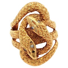 Vintage By in oro giallo 18 carati con occhi di diamante e dettagliato anello a fascia larga a doppio serpente